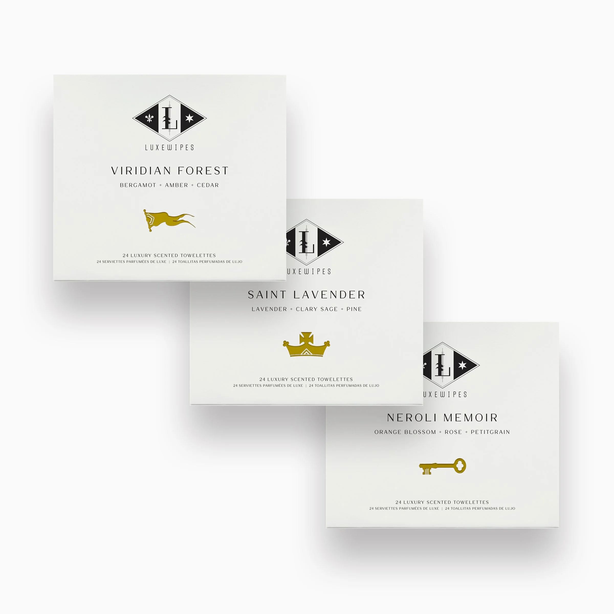 Front view of LUXEWIPES Viridian Forest, Saint Lavender, and Neroli Memoir boxes, each with 24 individually wrapped oxford-woven cotton wet wipes. Elevate your self-care ritual.