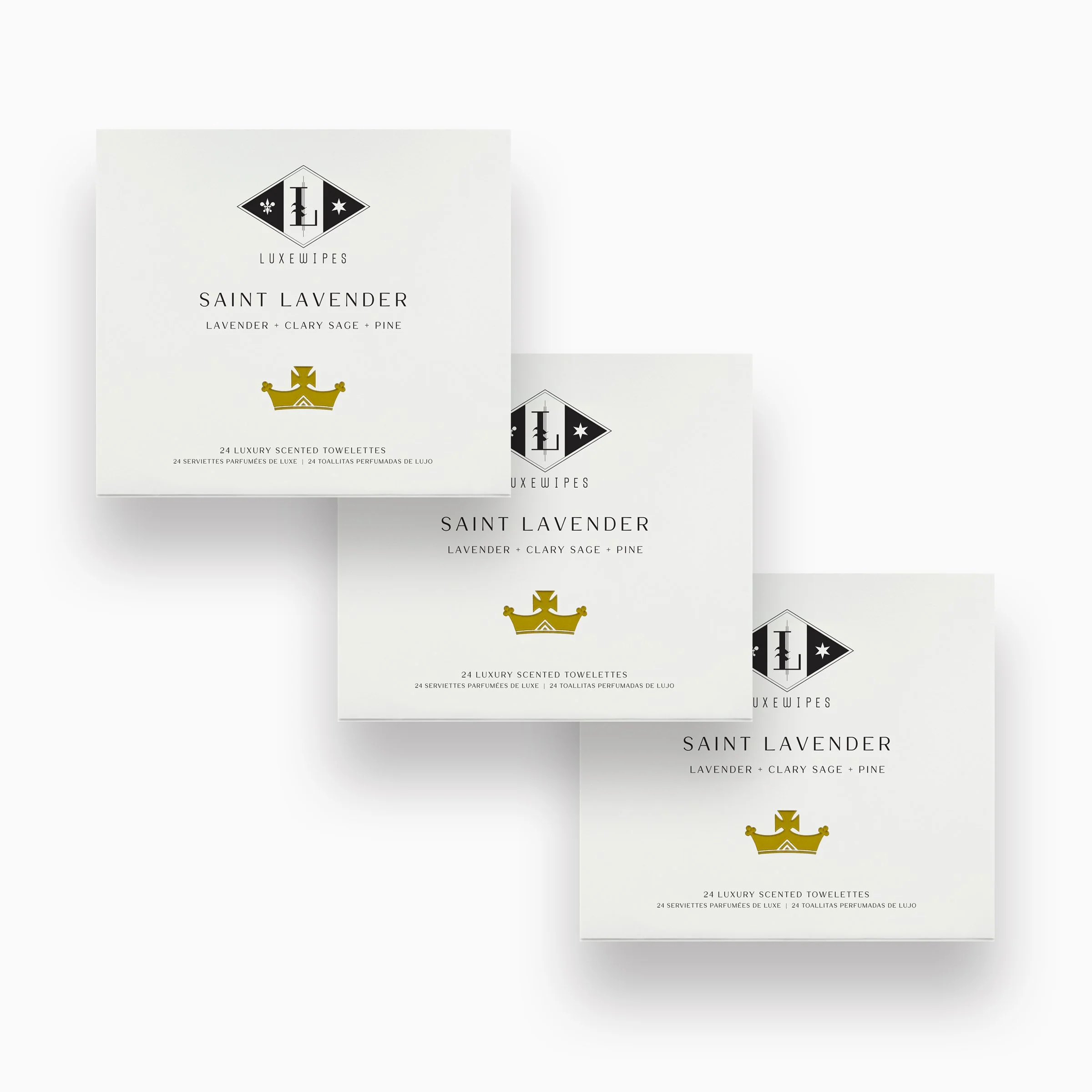 Front view of three stacked LUXEWIPES Saint Lavender boxes, each with 24 individually wrapped oxford-woven cotton wet wipes for a moment of relaxation and elevated self-care.