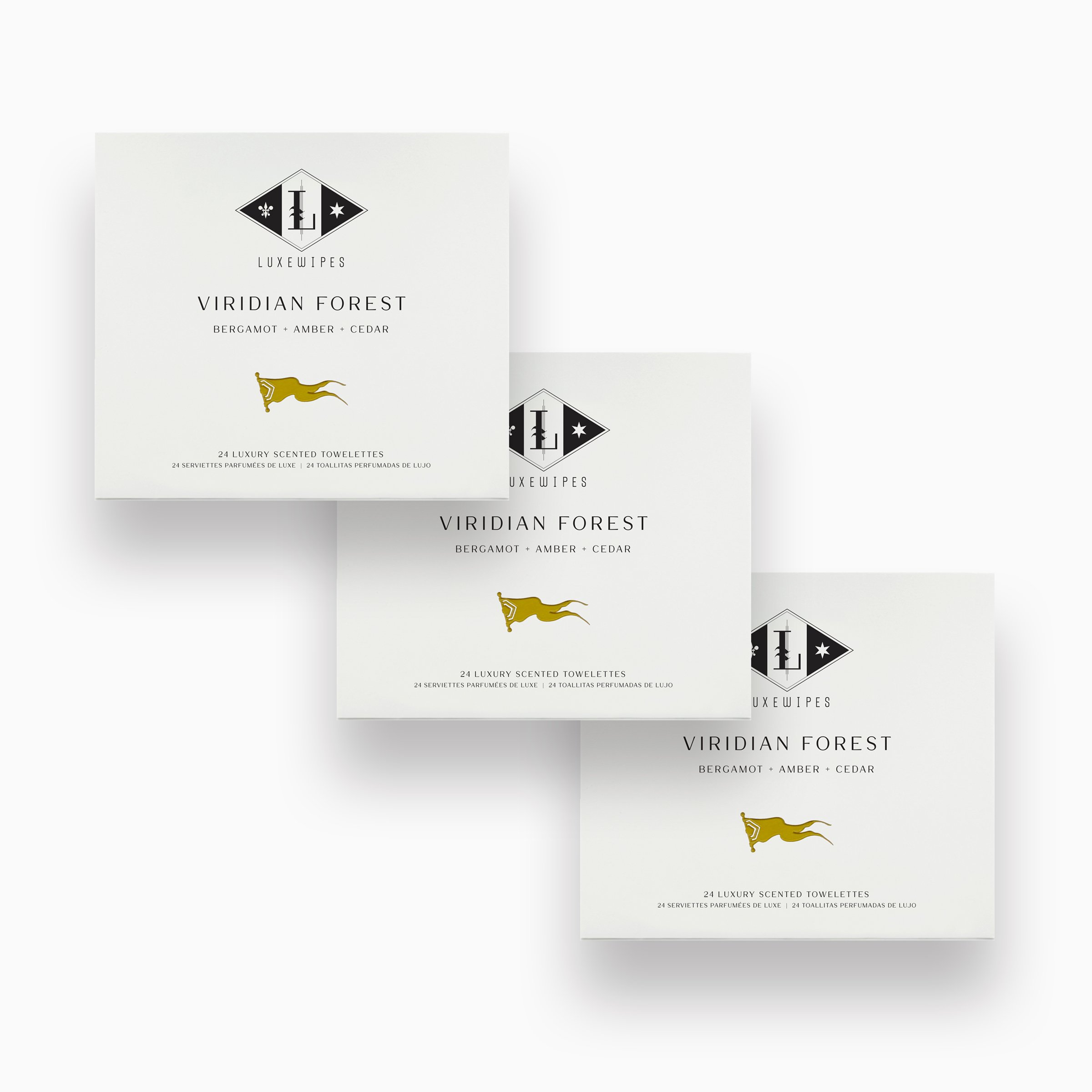 Front view of three stacked LUXEWIPES Viridian Forest boxes, each with 24 individually wrapped oxford-woven cotton wet wipes. Designed for luxury gifting and exquisite self-care.