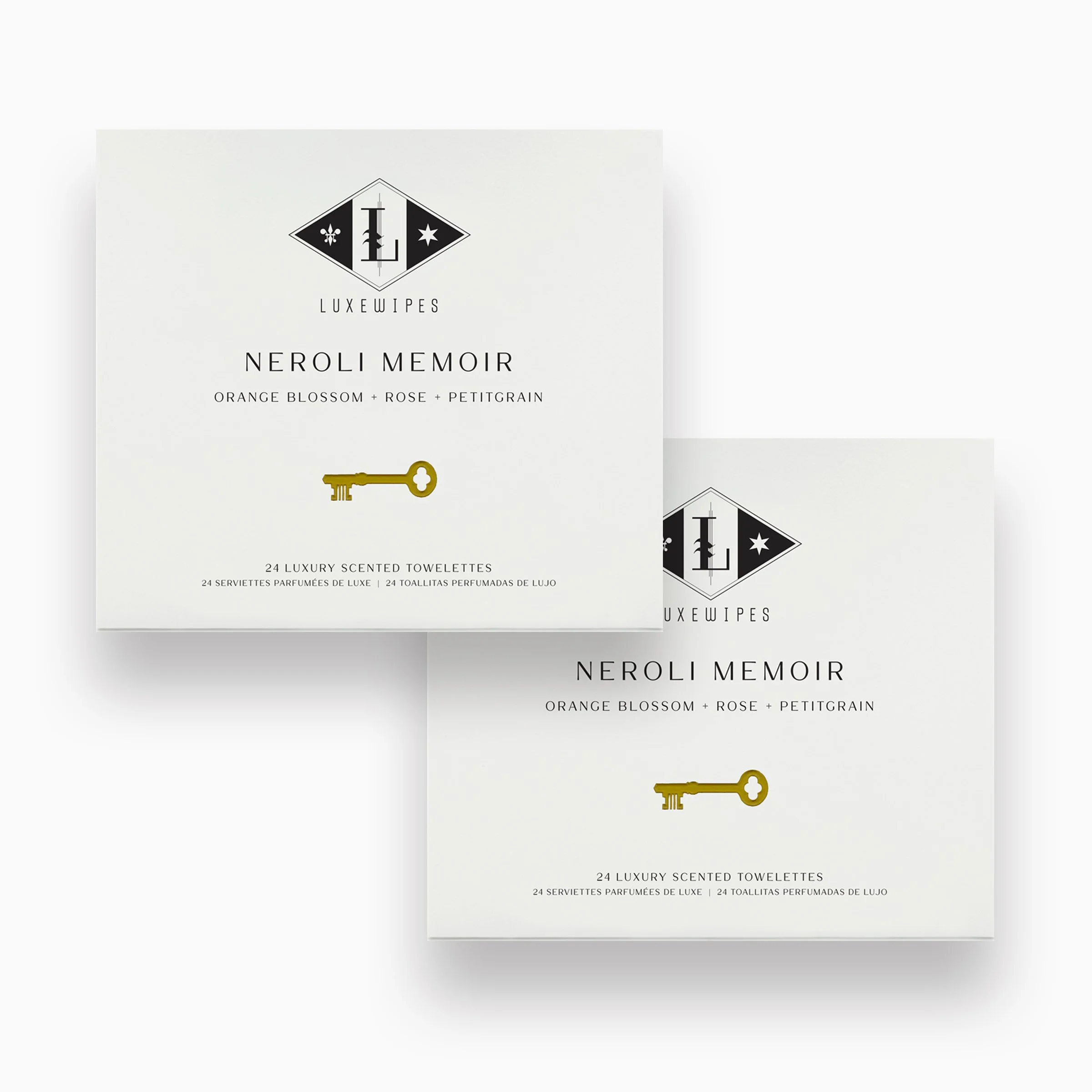 Front view of two LUXEWIPES Neroli Memoir boxes, each containing 24 individually wrapped oxford-woven cotton wet wipes. Elevate your self-care routine or give the perfect gift.