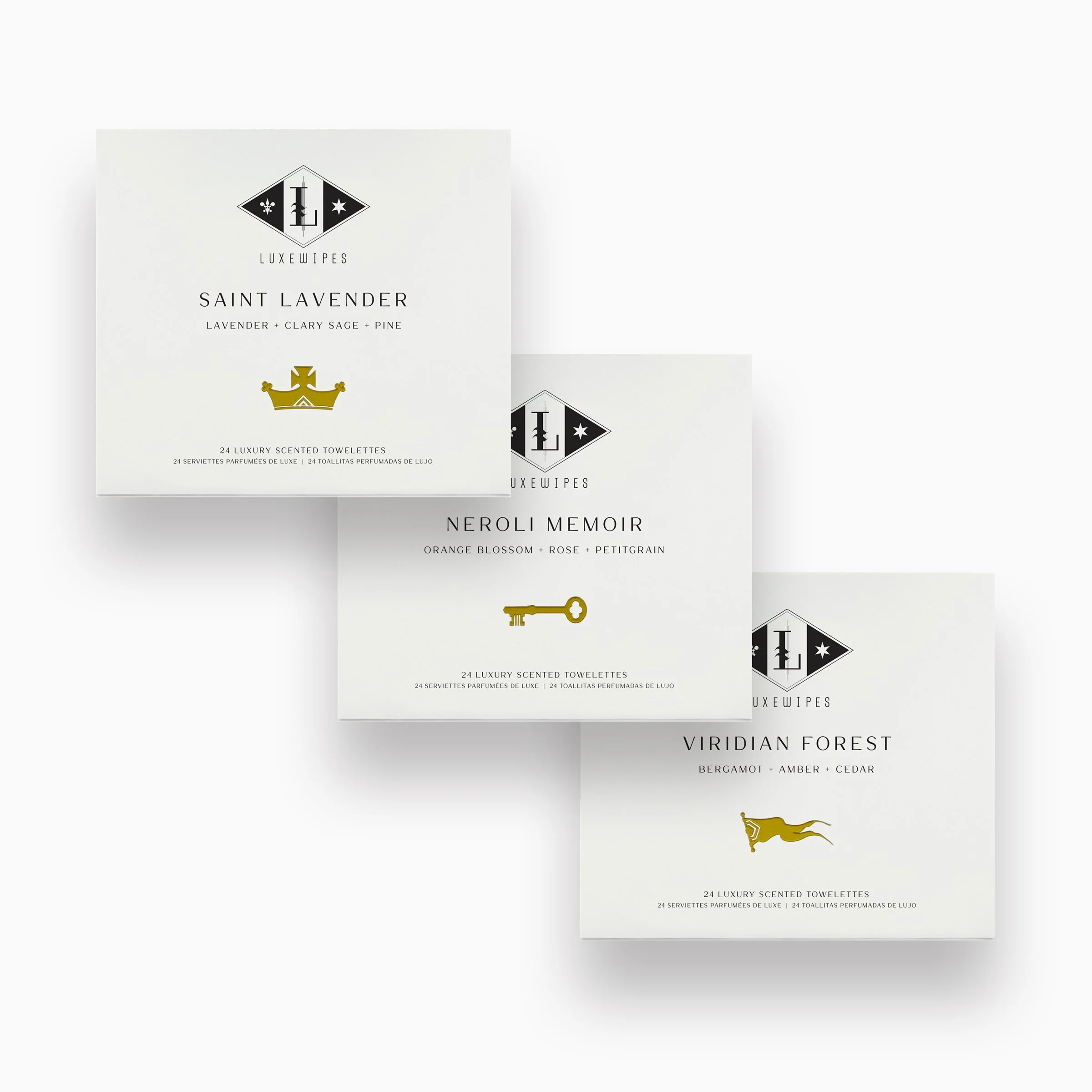 Front view of LUXEWIPES Saint Lavender, Neroli Memoir, and Viridian Forest boxes, each with 24 individually wrapped oxford-woven cotton wet wipes designed for a rich aromatic cleansing experience.