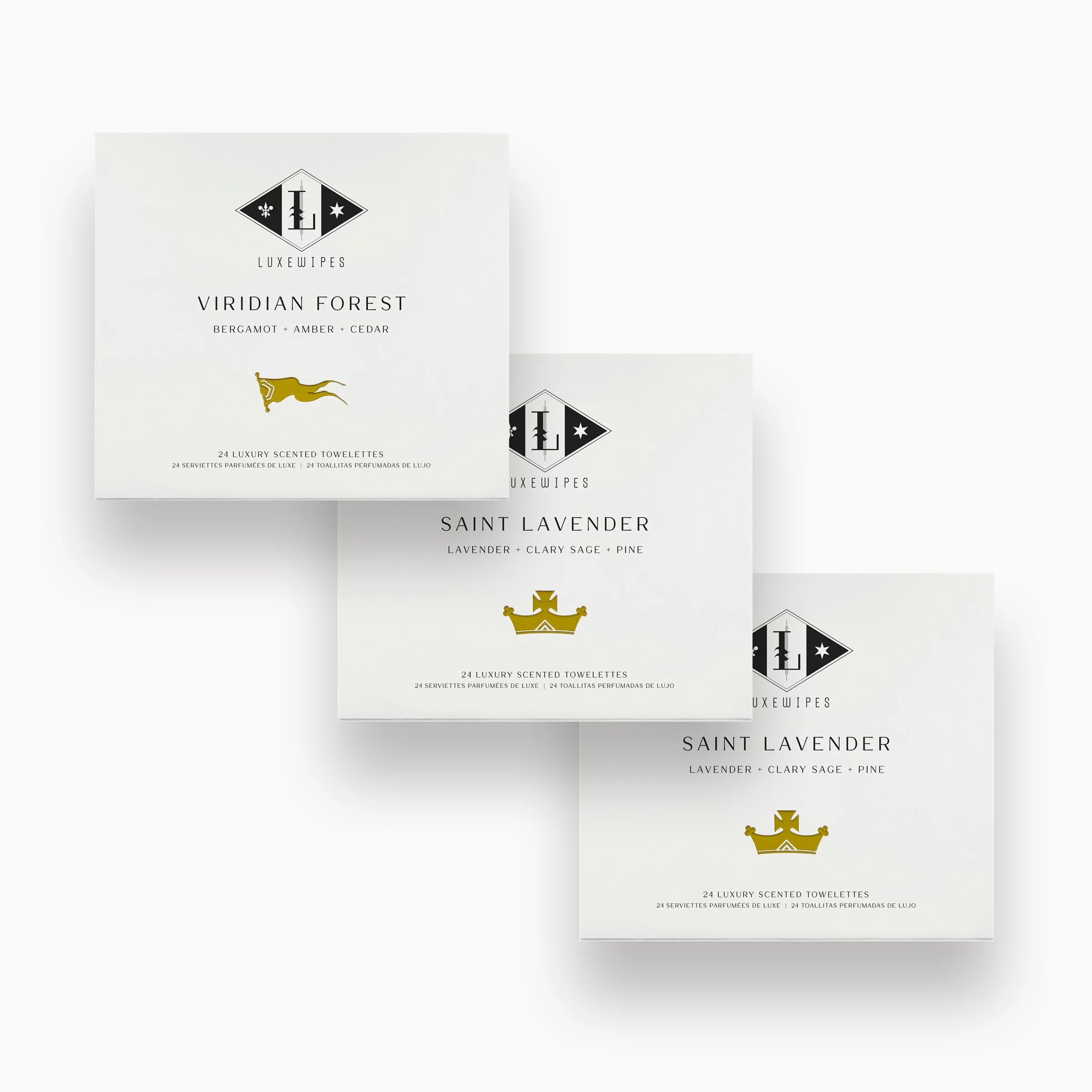 Front view of LUXEWIPES Viridian Forest, Saint Lavender and Saint Lavender boxes, each with 24 individually wrapped oxford-woven cotton moist towelettes. Perfect for elevated gifting and self-care.