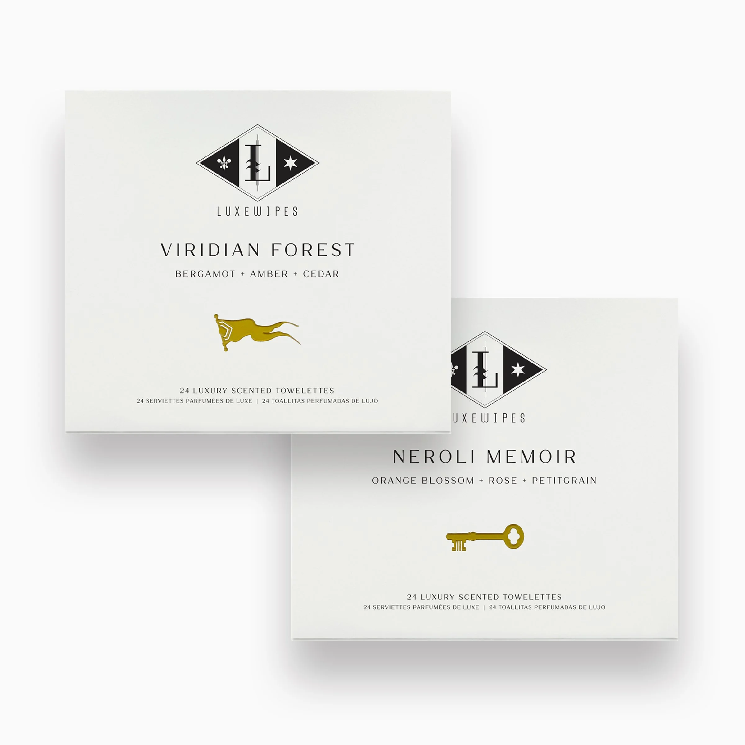 Front view of LUXEWIPES Viridian Forest box on top and Neroli Memoir on bottom. Features 24 individually wrapped oxford-woven cotton wet cleansing wipes per box, styled for upscale gifting and luxury.