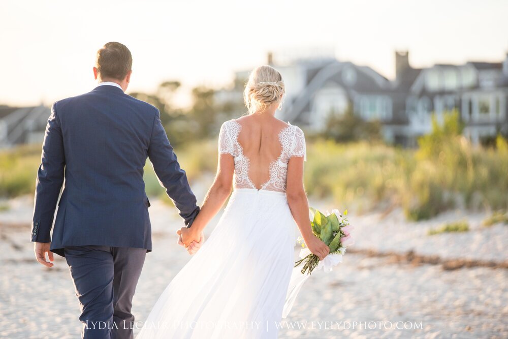 Dream Wedding Photography couple walking hand in hand on beach Cape Cod MA