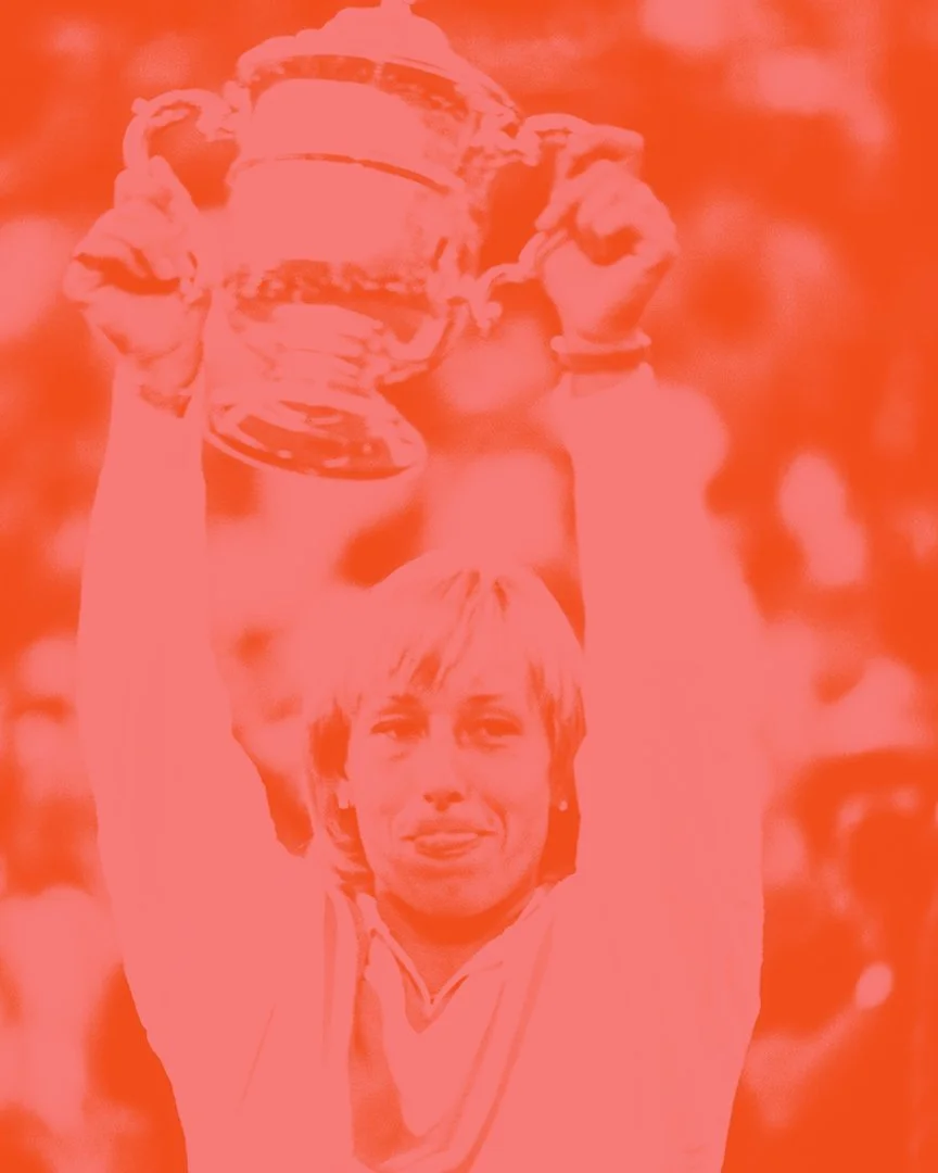 Person holding a trophy overhead, celebrating a victory.