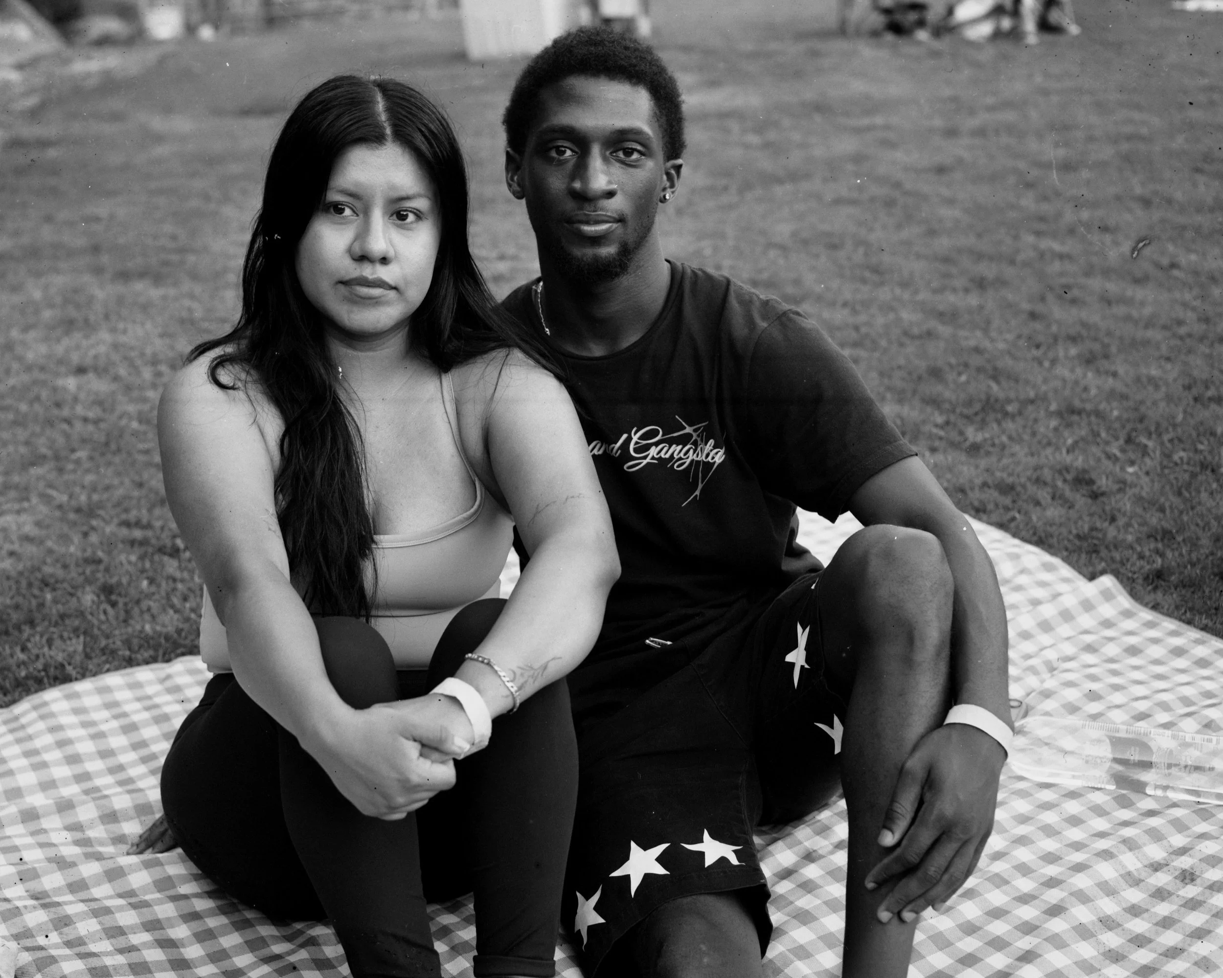 Young couple watches the fireworks at the 4th of July celebration at Stone Mountain. 

It was their first time at the monument and they came because they heard it was the "best lightshow & fireworks in the state". They shared that they thought that t