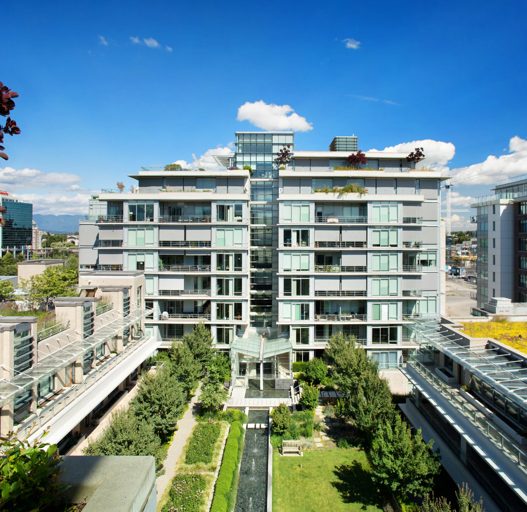 Kayak at Olympic Village: View E to Courtyard Garden. Design Concept: Gregory Borowski at Merrick Architecture for Millennium. Photo: Ema Peter 2013