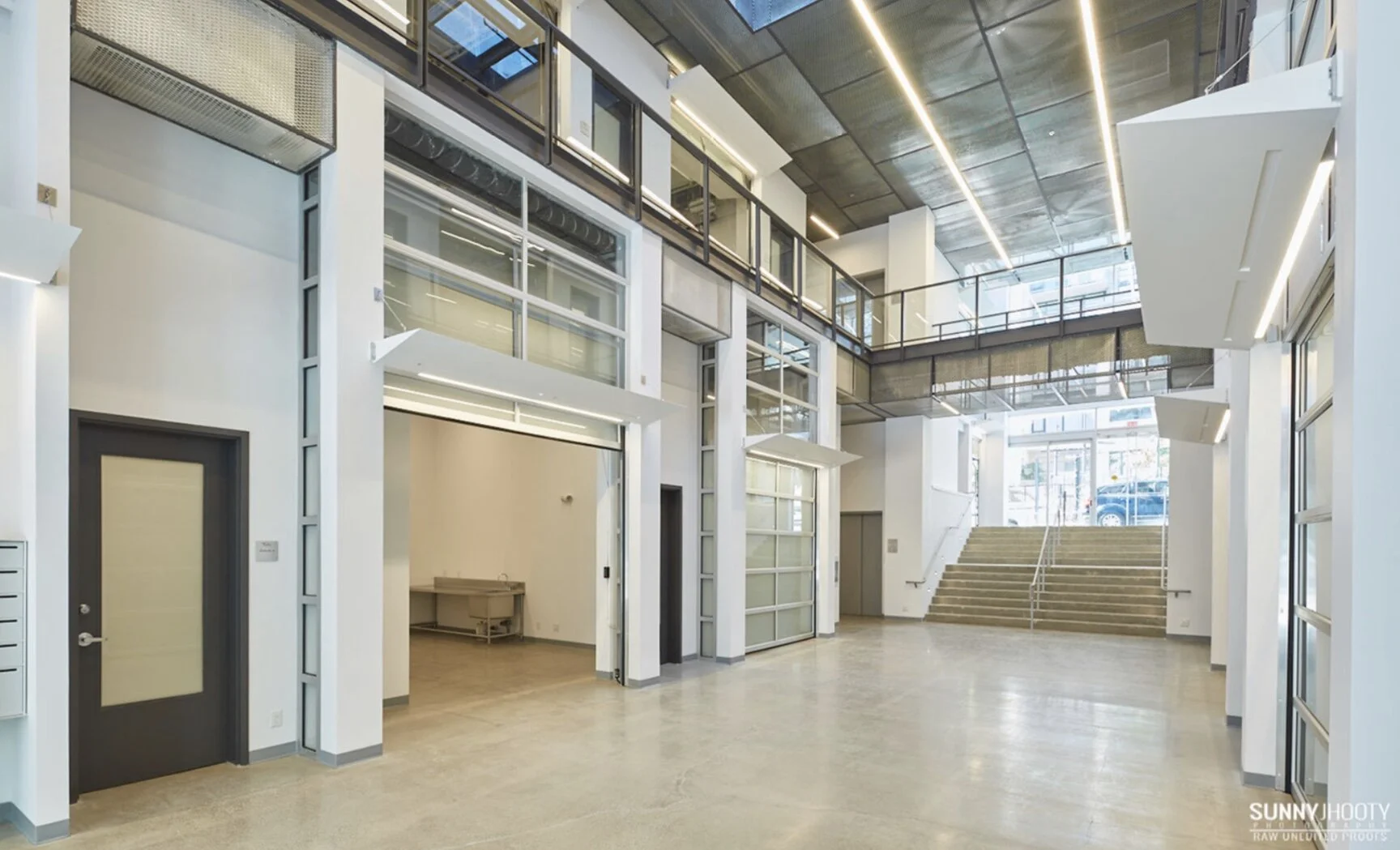 Howe Street Studios: Ground Floor View. Design Concept: Gregory Borowski at Merrick Architecture for Bonds Group on behalf of the City of Vancouver. Photo: Sunny Jhooty 2019