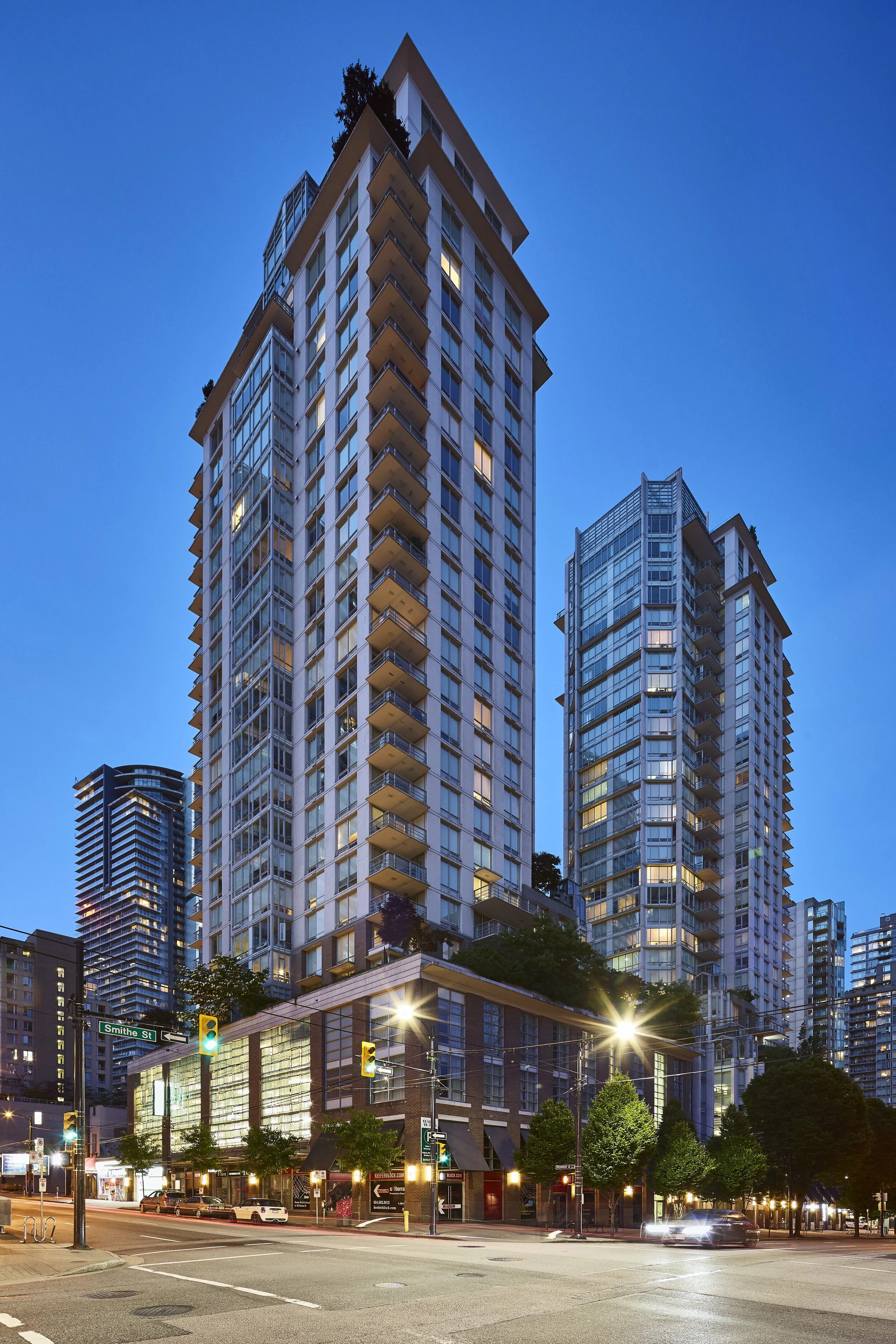 Symphony Place: Dusk View from SW. Design Concept: Paul Merrick. Executive Architect: Gregory Borowski at Merrick Architecture for Solterra. Photo: Sunny Jhooty 2017