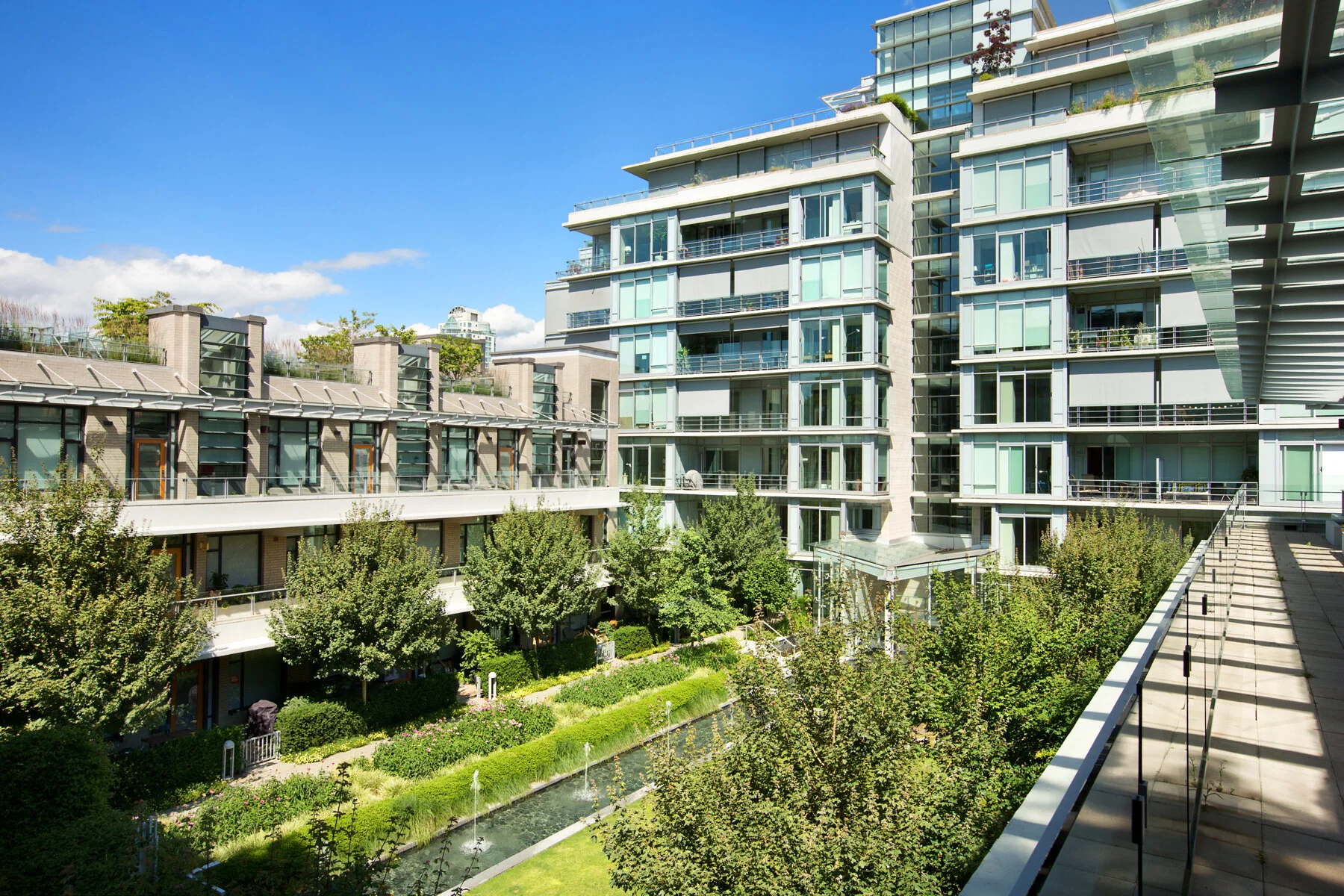 Kayak at Olympic Village: View NE into Courtyard Garden. Design Concept: Gregory Borowski at Merrick Architecture for Millennium. Photo: Ema Peter 2013