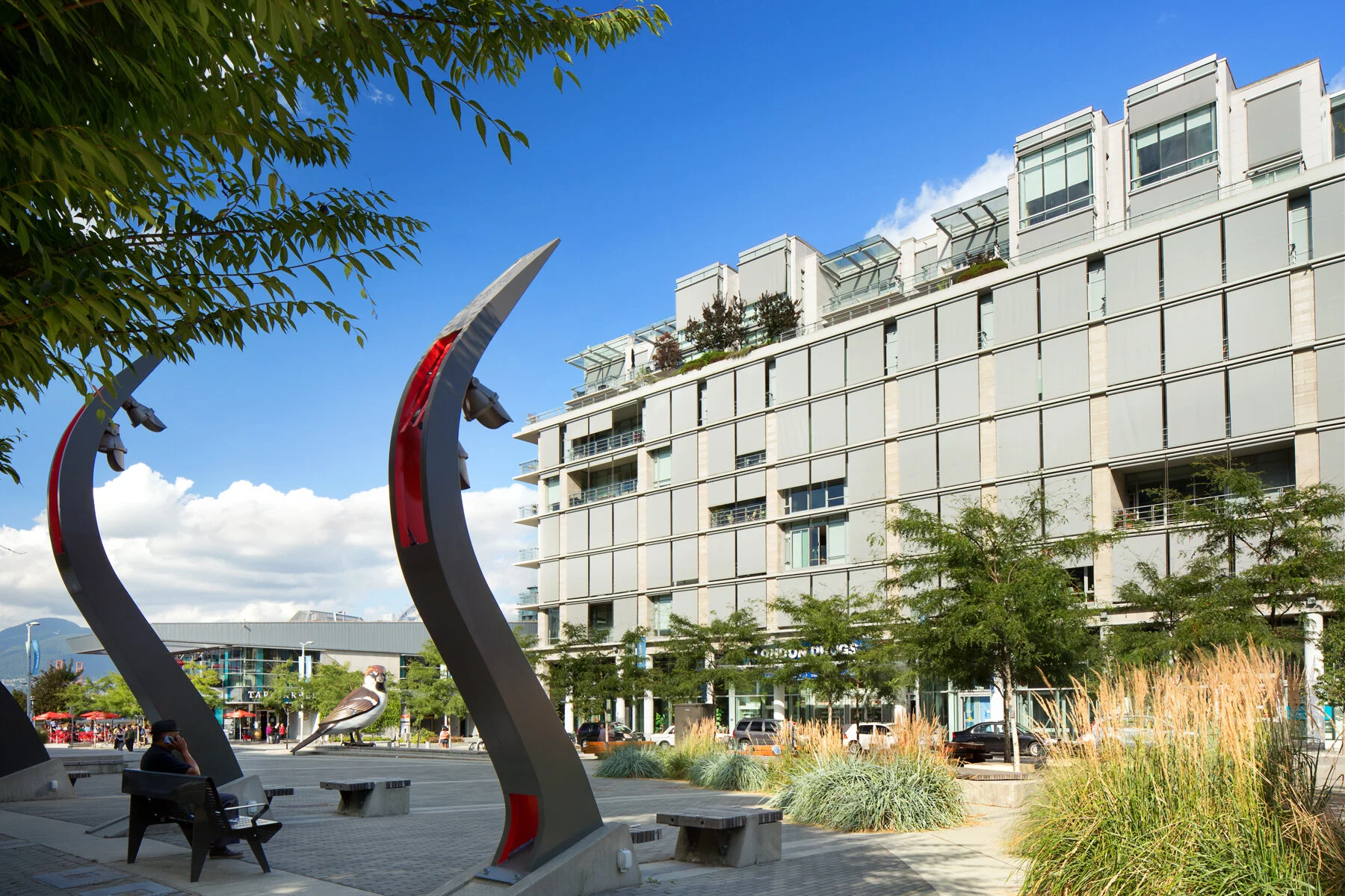 Kayak at Olympic Village: View NE from Public Square with Blinds Down. Design Concept: Gregory Borowski at Merrick Architecture for Millennium. Photo: Ema Peter 2013