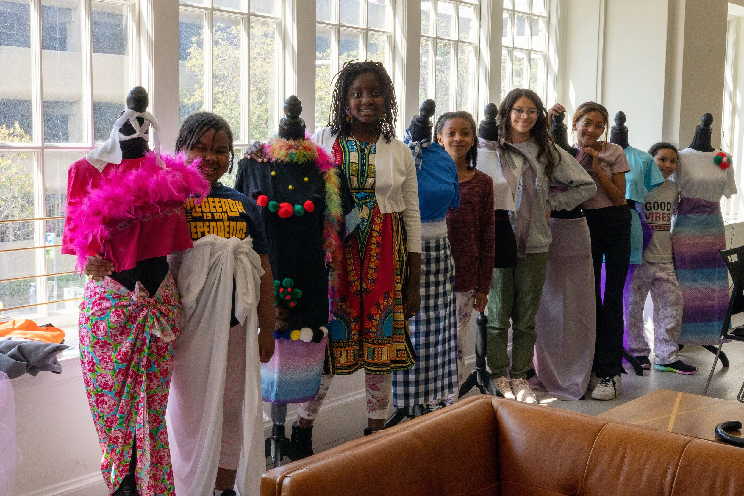 Fashion designed by kids during The Madame X Academy Oh, Sew Beautiful Black Fashion Experience