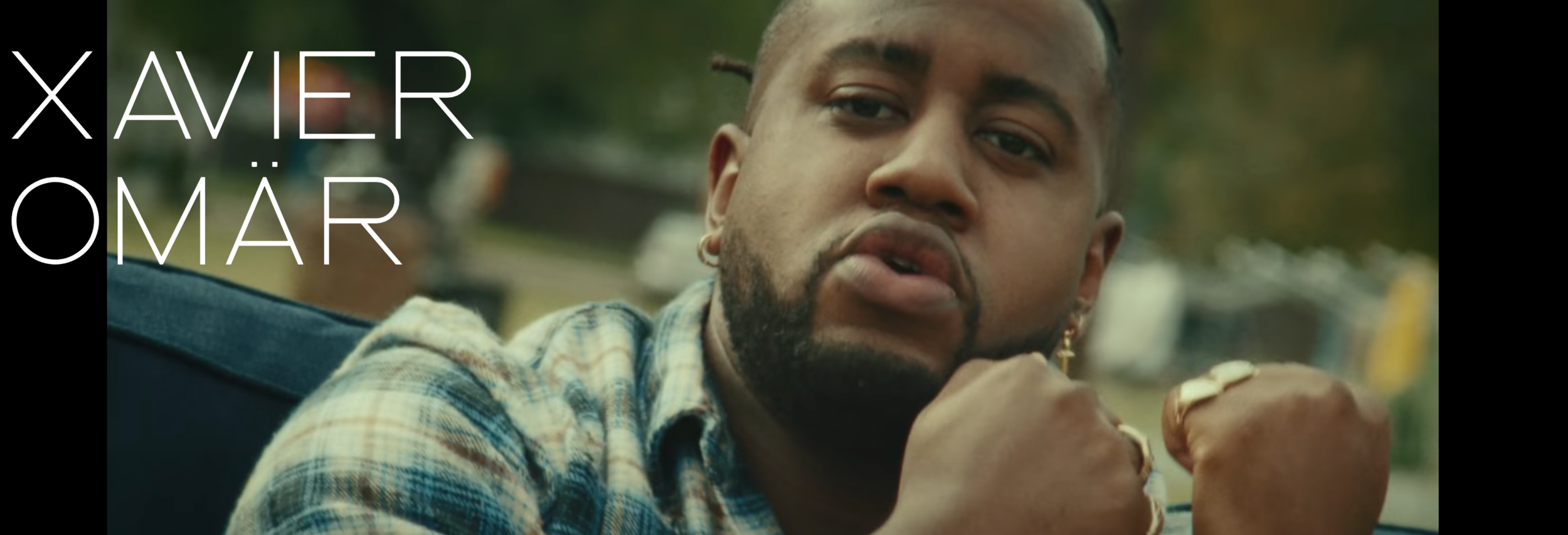 XAVIER OMAR HEADER.png