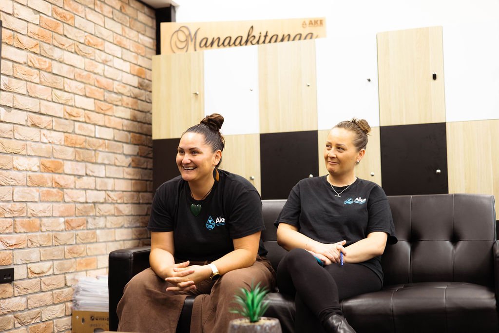 Two Ake team members at the Ake office