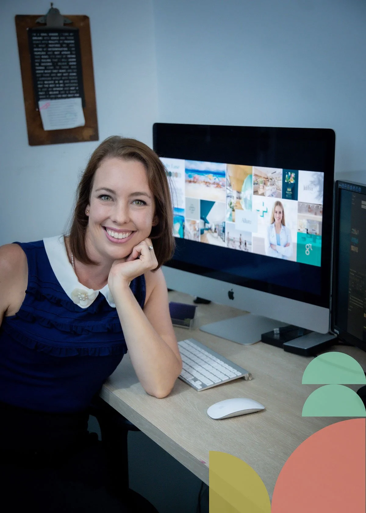 Aynsley with her computer completing branding and assets for her customers