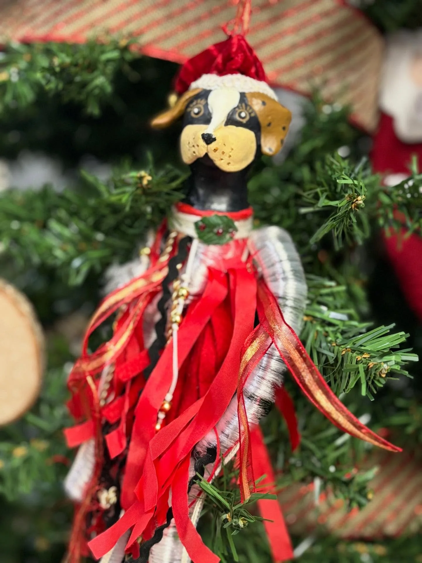In today&rsquo;s ugly ornament update, we introduce you to ribbon dog!  To be honest, I am unsure of the origins of ribbon dog but we sure are glad he is on our tree!  He&rsquo;s been around for a while!
This year&rsquo;s entries are coming in fast. 