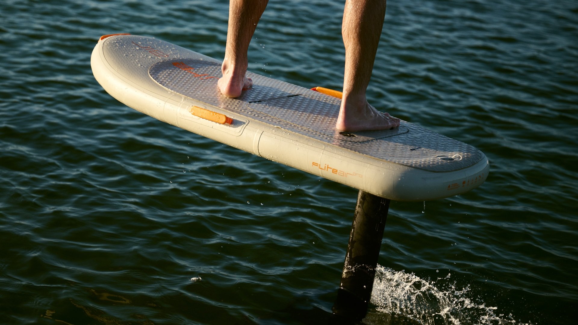 Rider eFoiling on the Fliteboard AIR inflatable electric hydrofoil