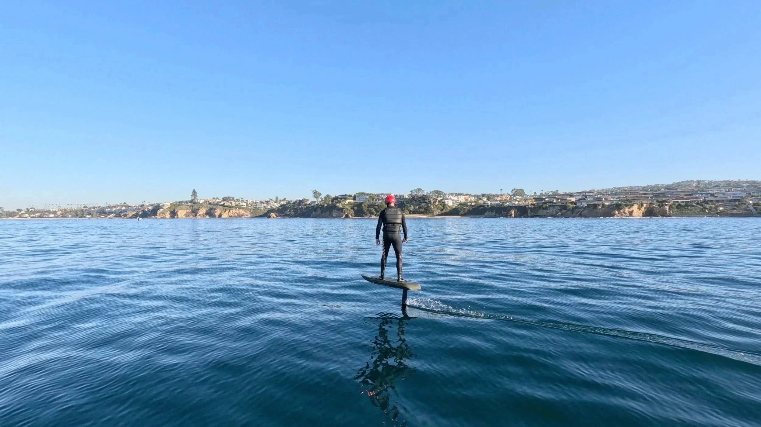 Fliteboard rider eFoiling along the Southern California coast