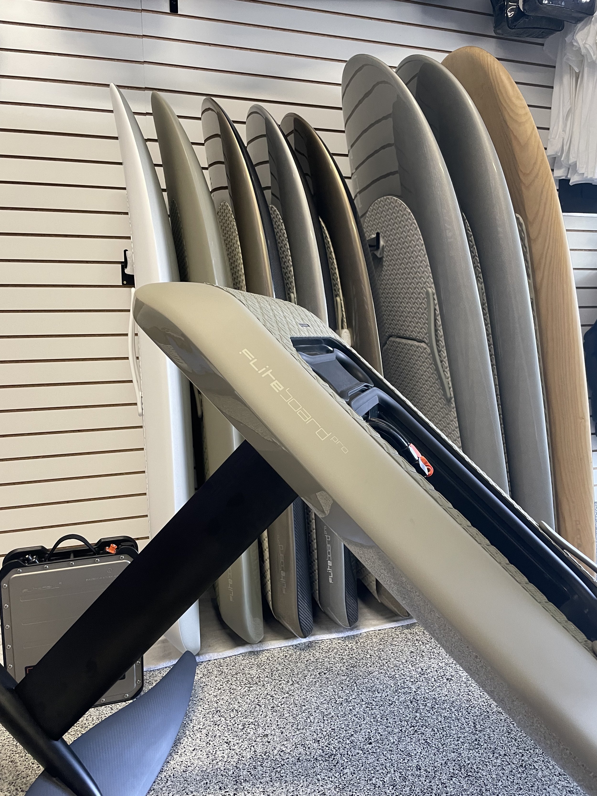 Fliteboards lined up in the OC Foil showroom in Orange County ready for demos and sales