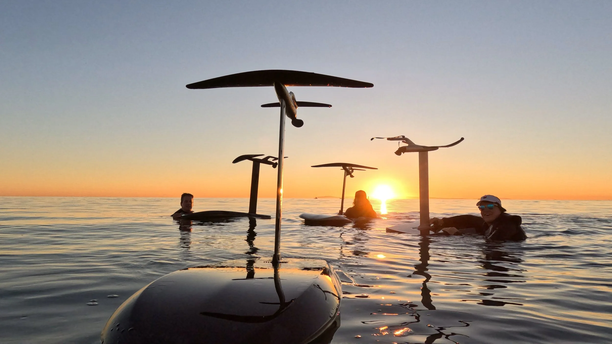Fliteboard group ride at sunset in Newport Beach, California with OC Foil