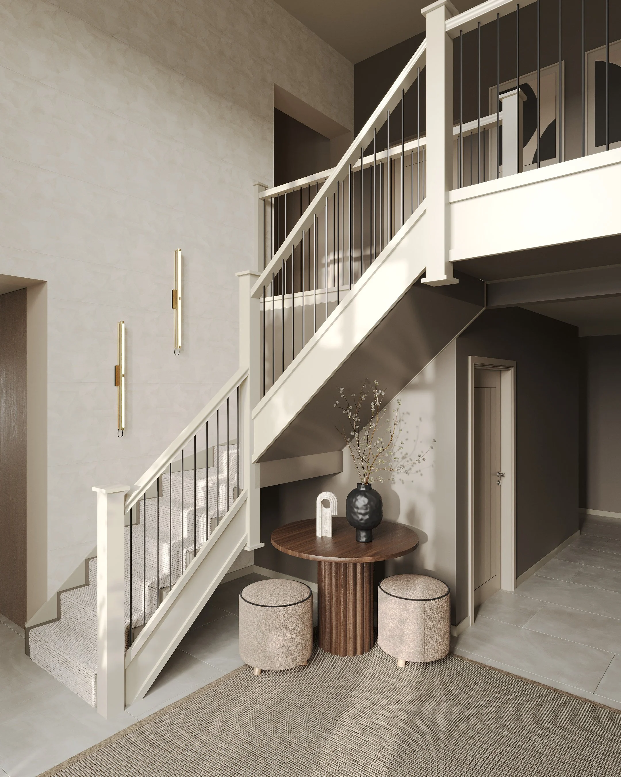 Interior of a modern home with a staircase, decorative wall lights, and a small seating area with a round wooden table, a vase with branches, and two ottomans.