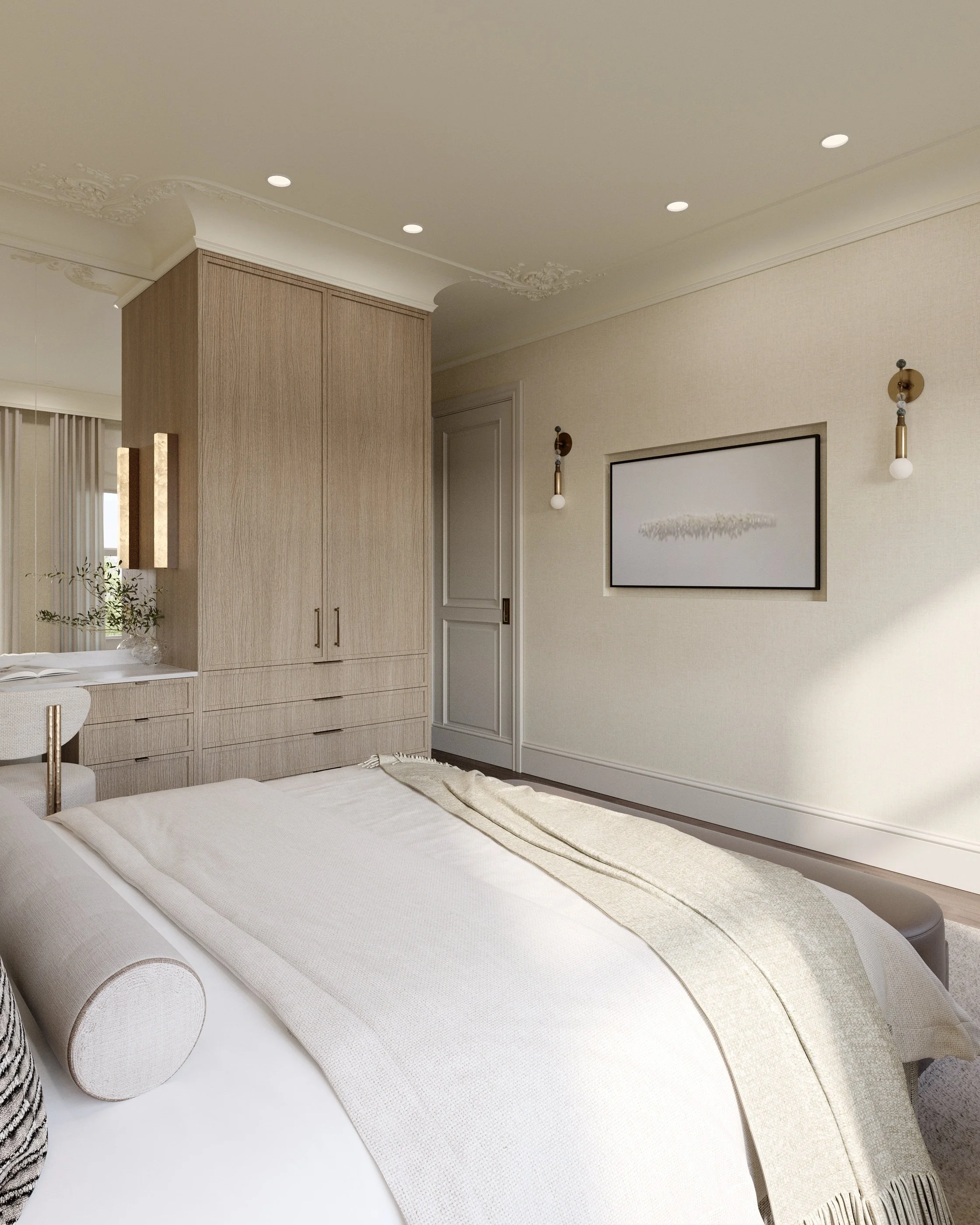 A cozy bedroom with a neatly made bed, beige bedspread, and decorative pillows. There is a built-in wooden wardrobe and a small desk with a plant. The room features elegant wall sconces, a framed artwork, and soft ceiling lights, creating a warm and 