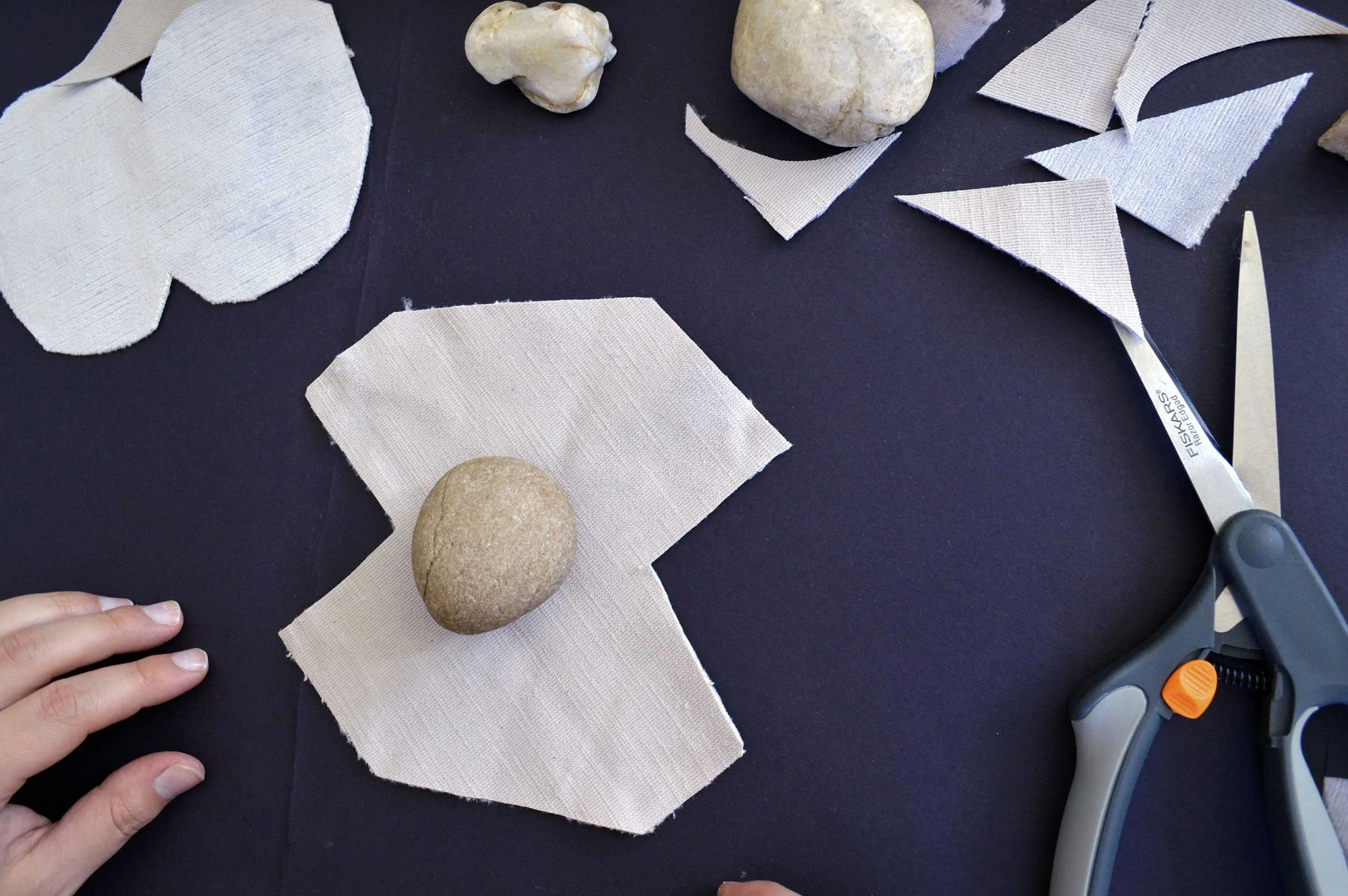  Velvet Stones (Process) ; Creek-collected stones, vintage lavender velvet, sewing materials; 100 count; 2019