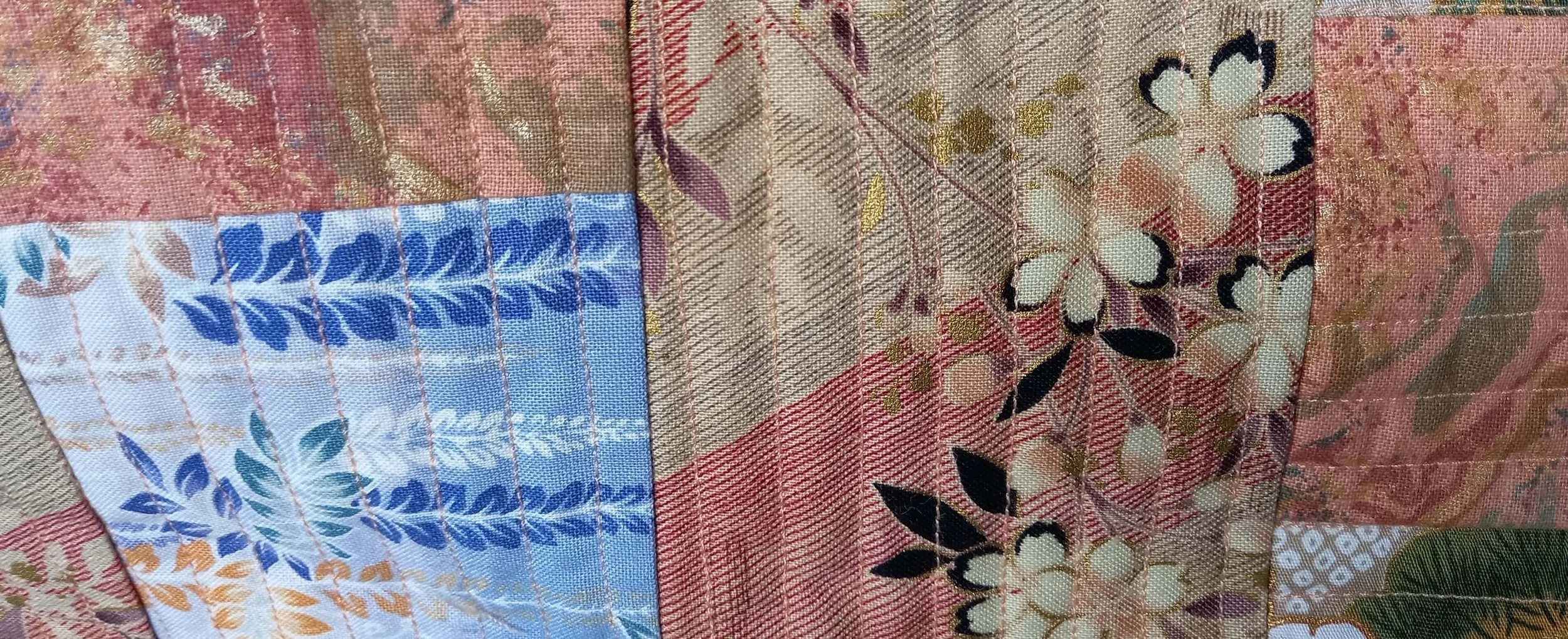 Pink and Blue Patchwork Pouch Close Up.jpg