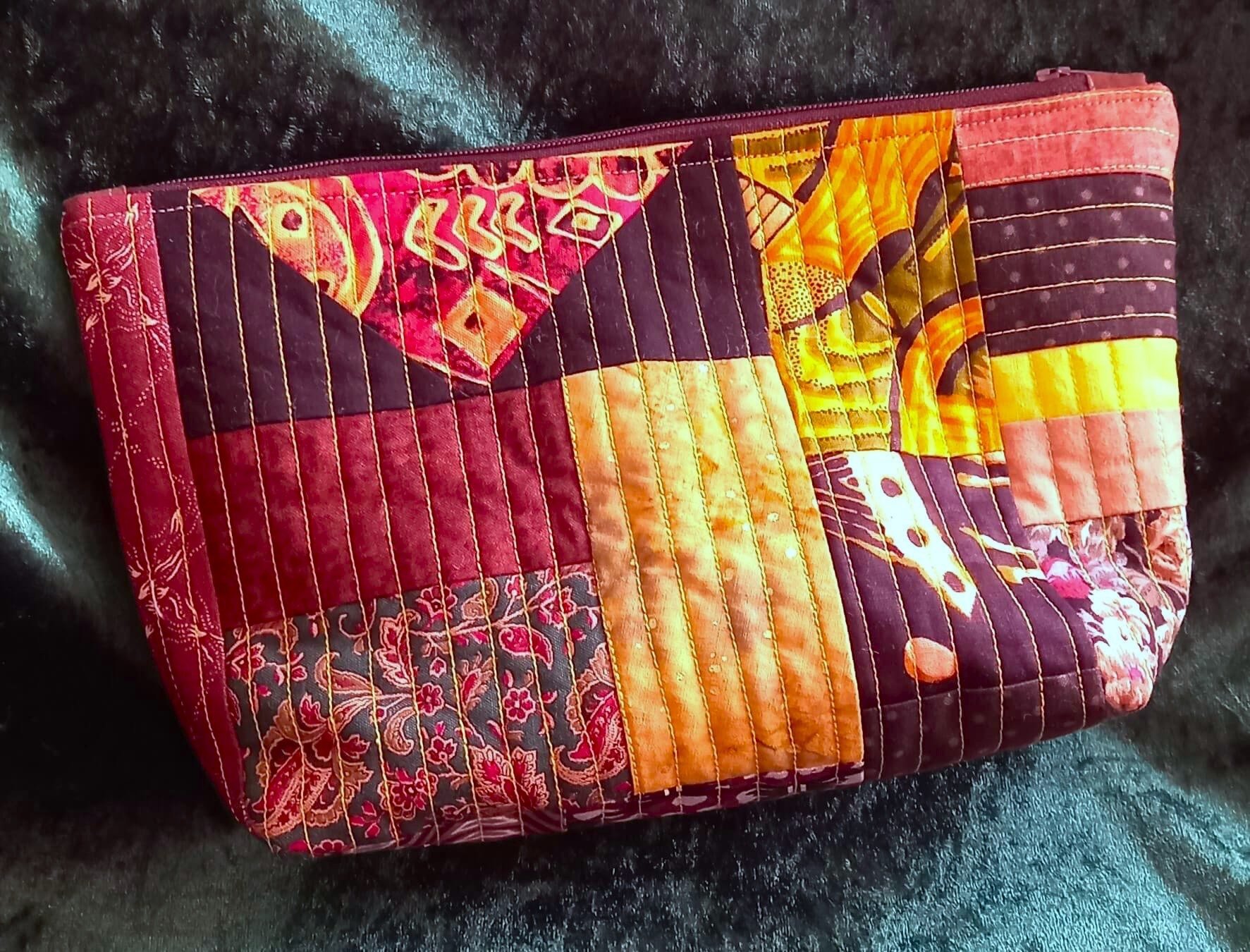 Warm colours patchwork pouch.jpg