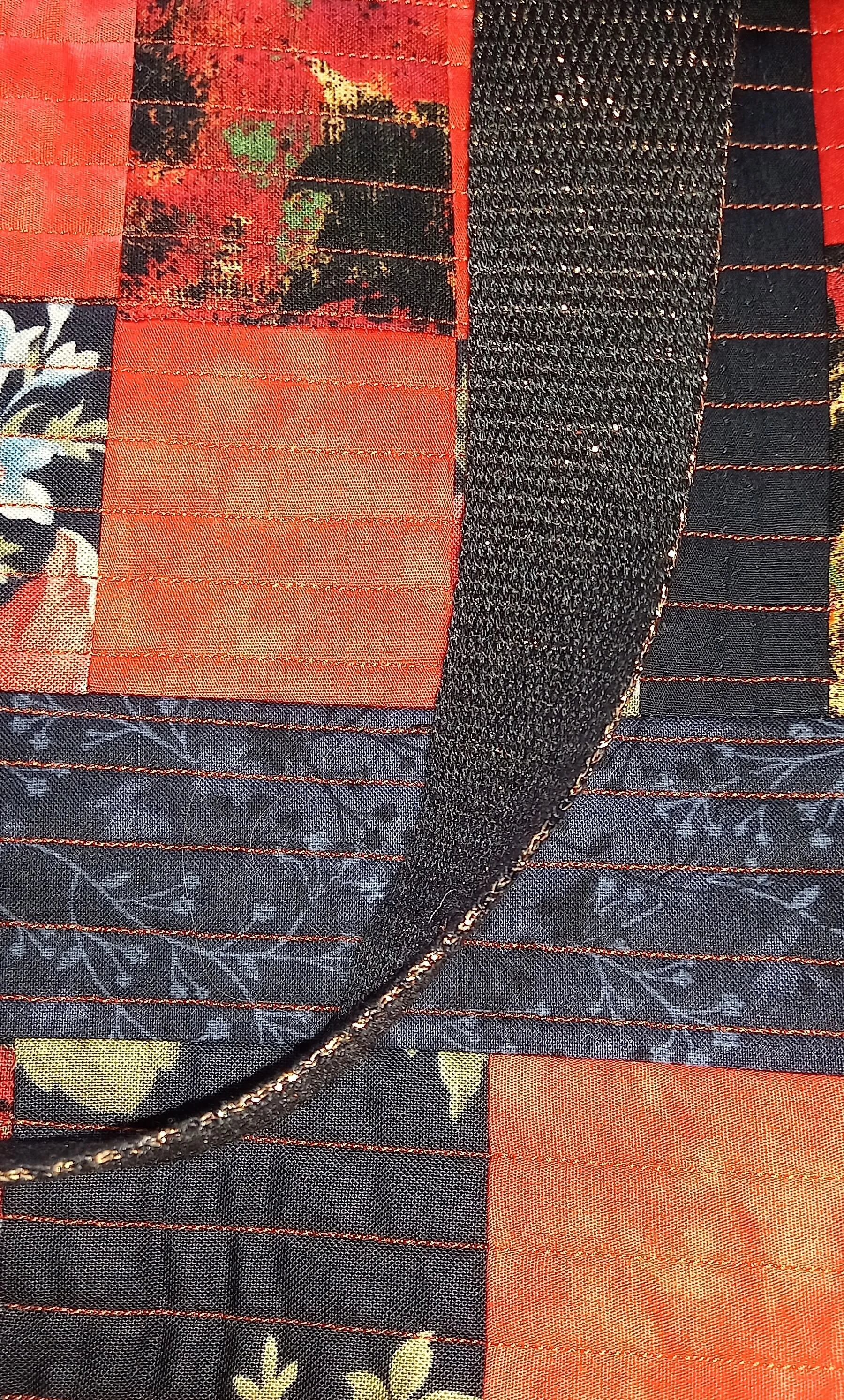 tb27 tote bag orange black patchwork close up strap.jpg