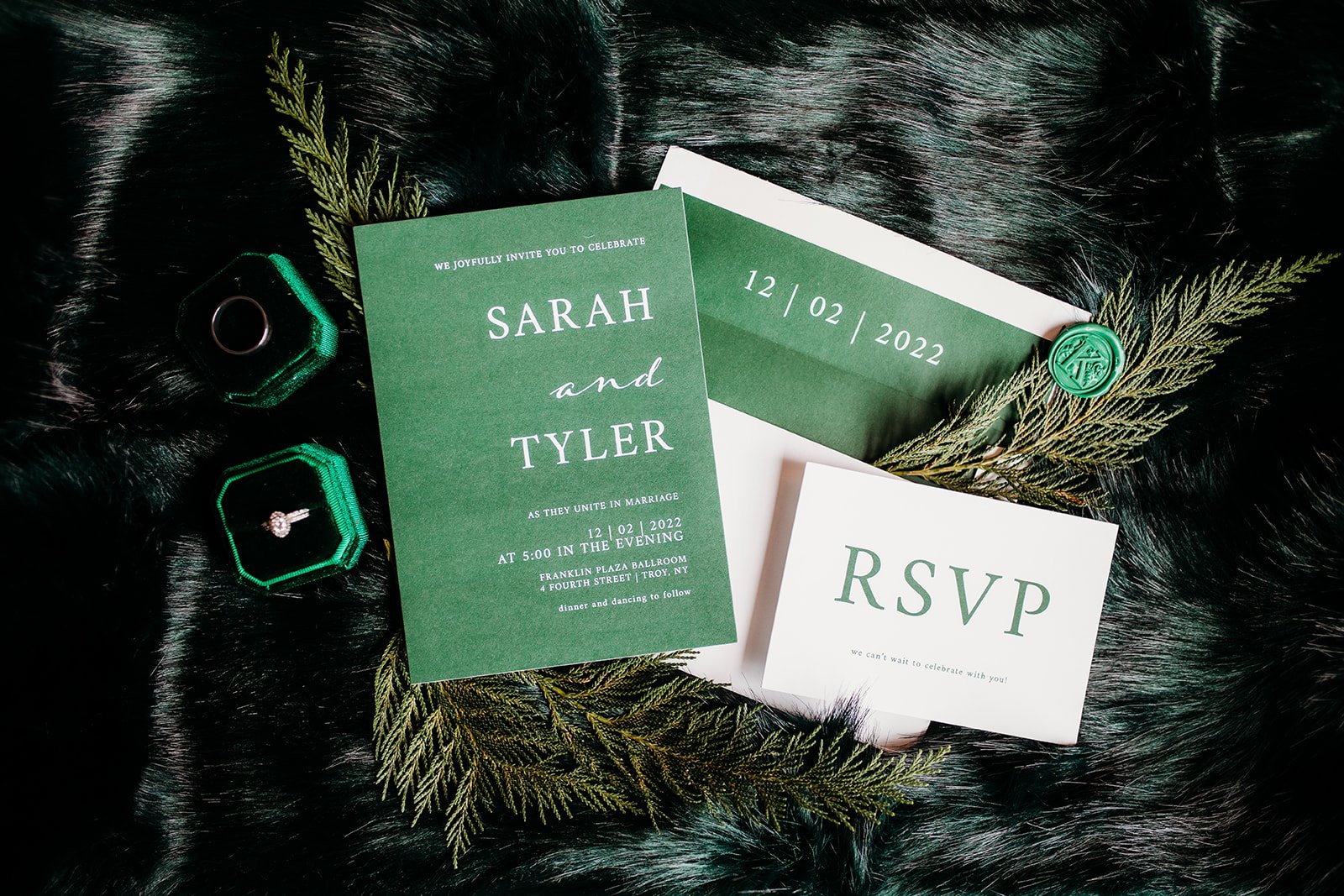 emerald green and white invitation suite for winter wedding