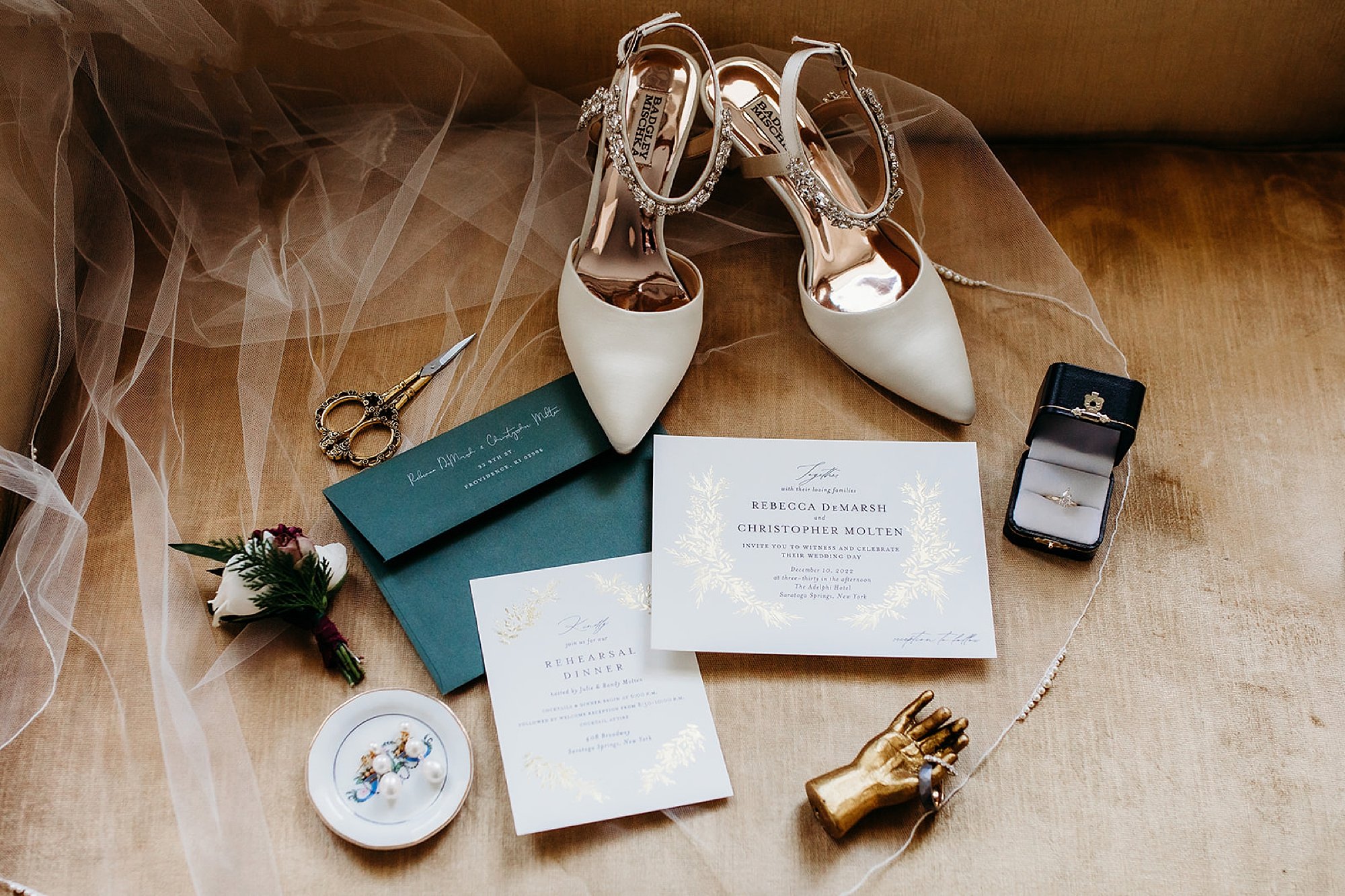 bride's shoes and invitation for winter wedding at The Adelphi Hotel