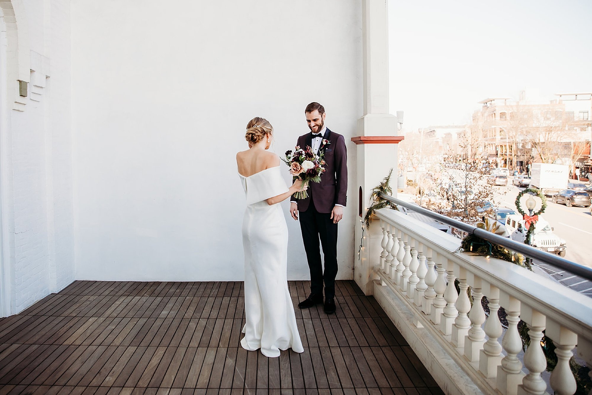 bride cries during first look on balcony during first look at The Adelphi Hotel