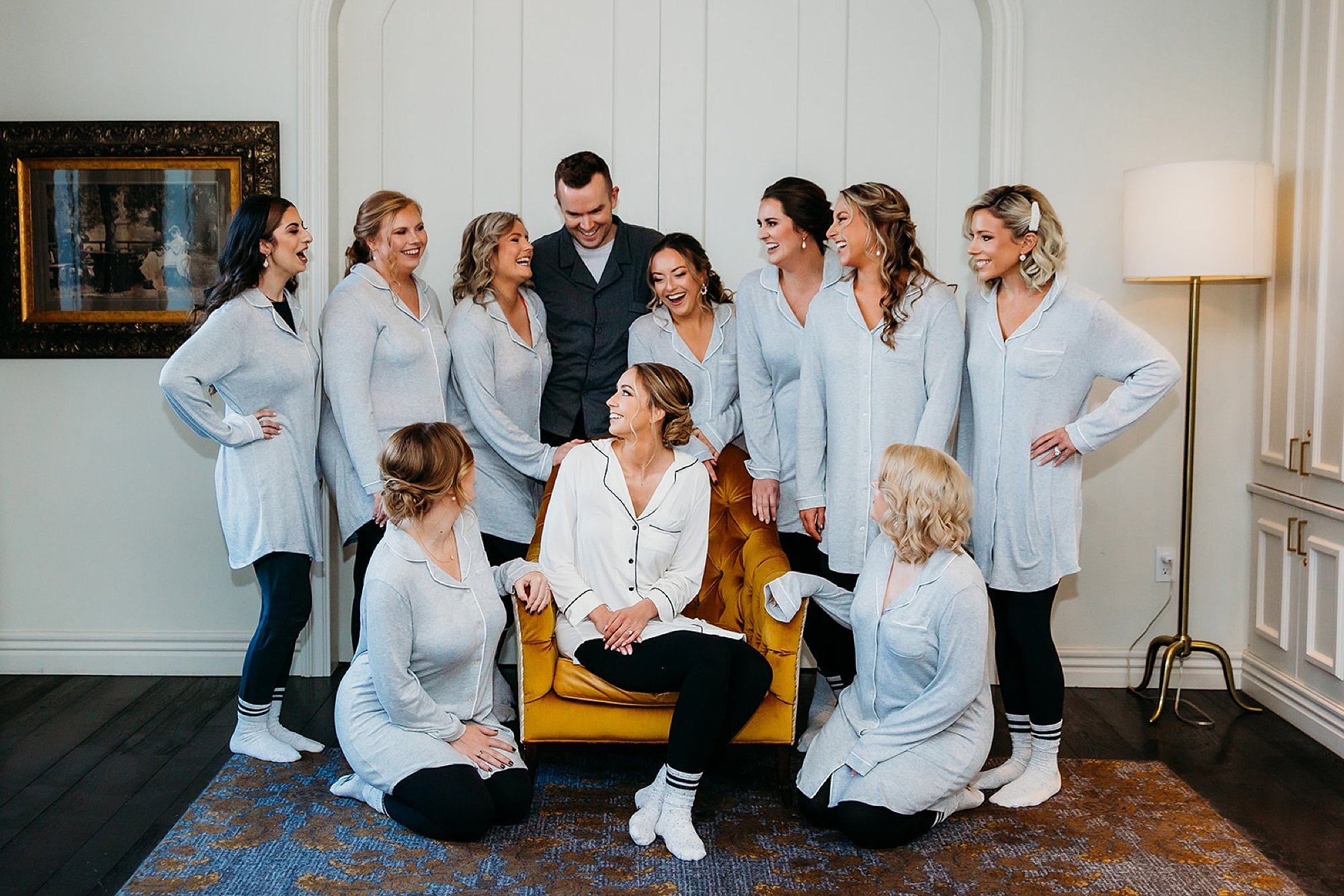 bride poses with bridesmaids and man of honor in The Adelphi Hotel