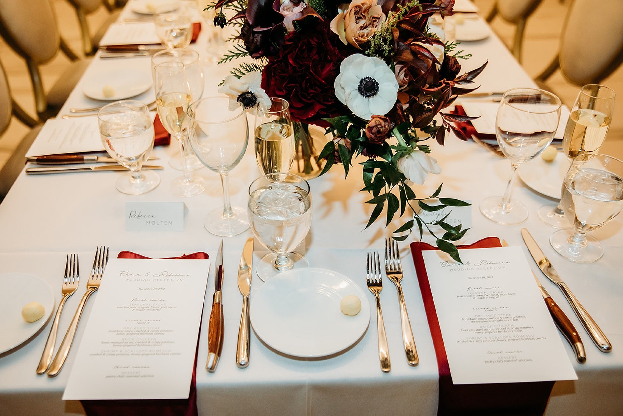place setting with gold and burgundy details