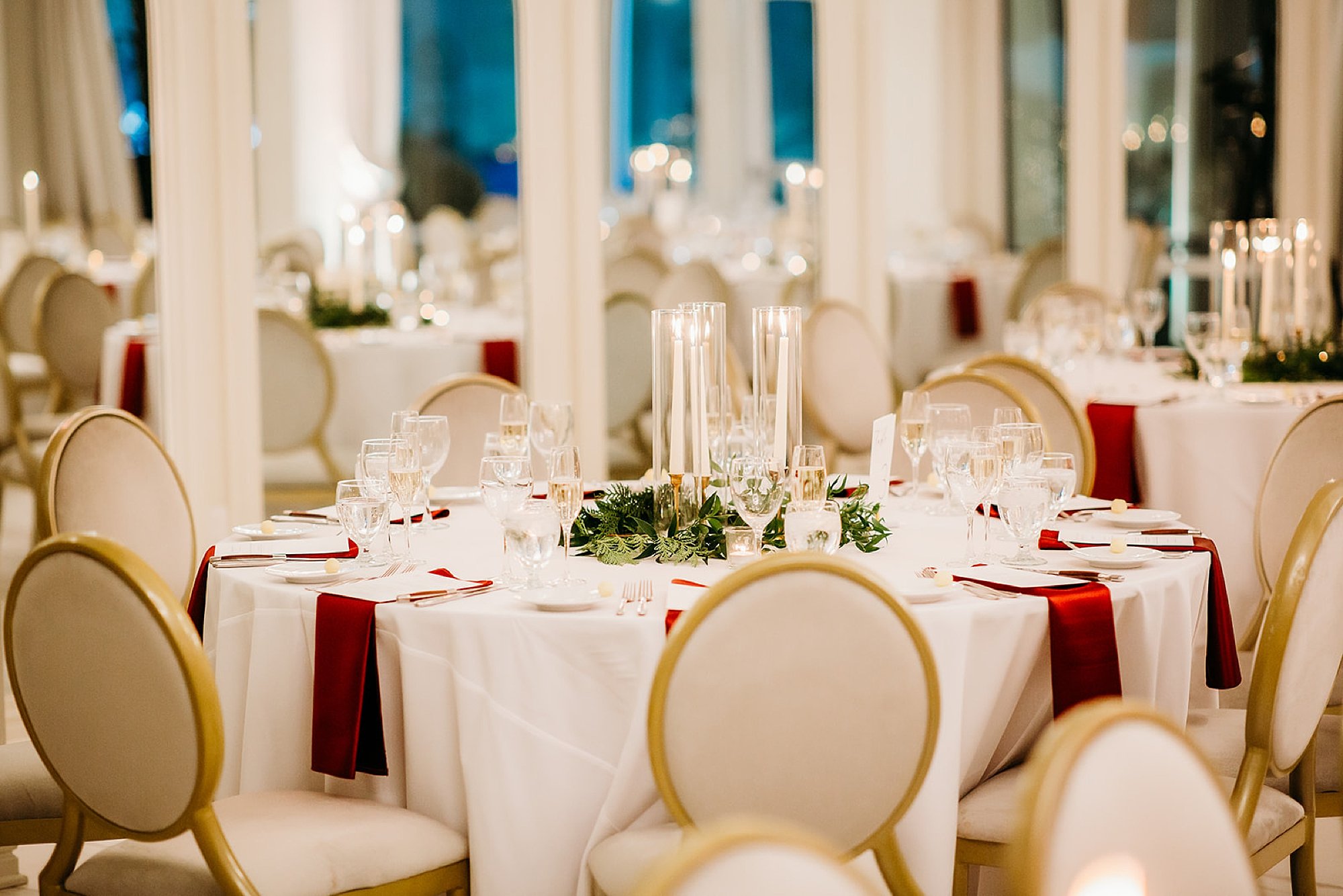 winter reception in the atrium at The Adelphi Hotel with gold and burgundy details 