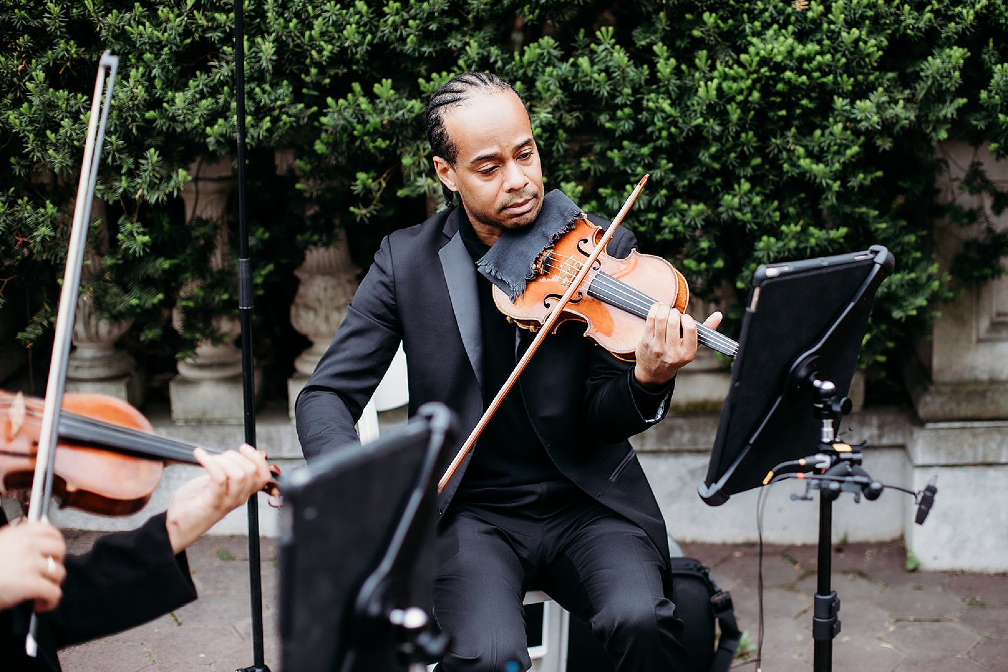black man plays violin for wedding ceremony 