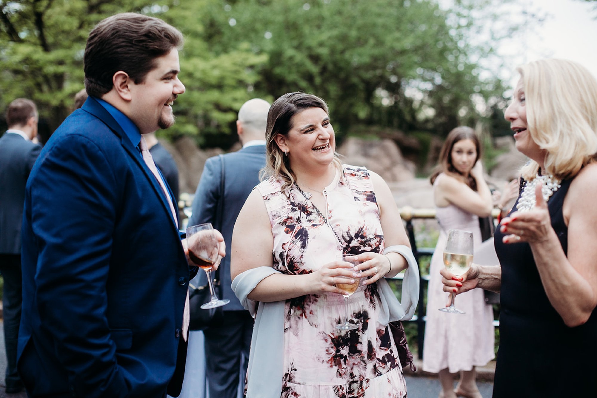 guests mingle during cocktail hour at The Bronx Zoo wedding reception