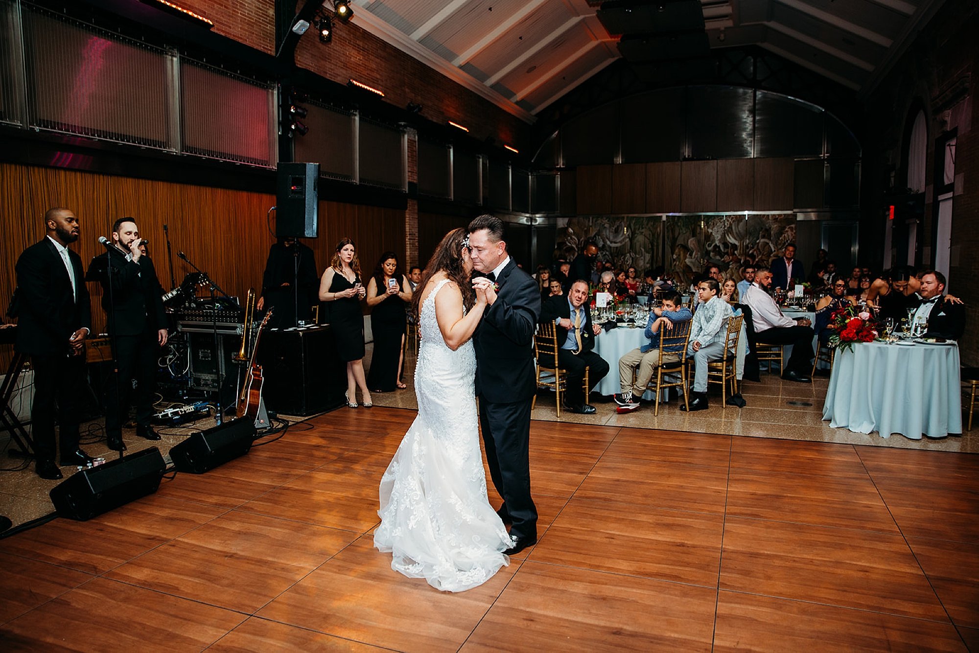 bride dances with dad at the Bronx Zoo