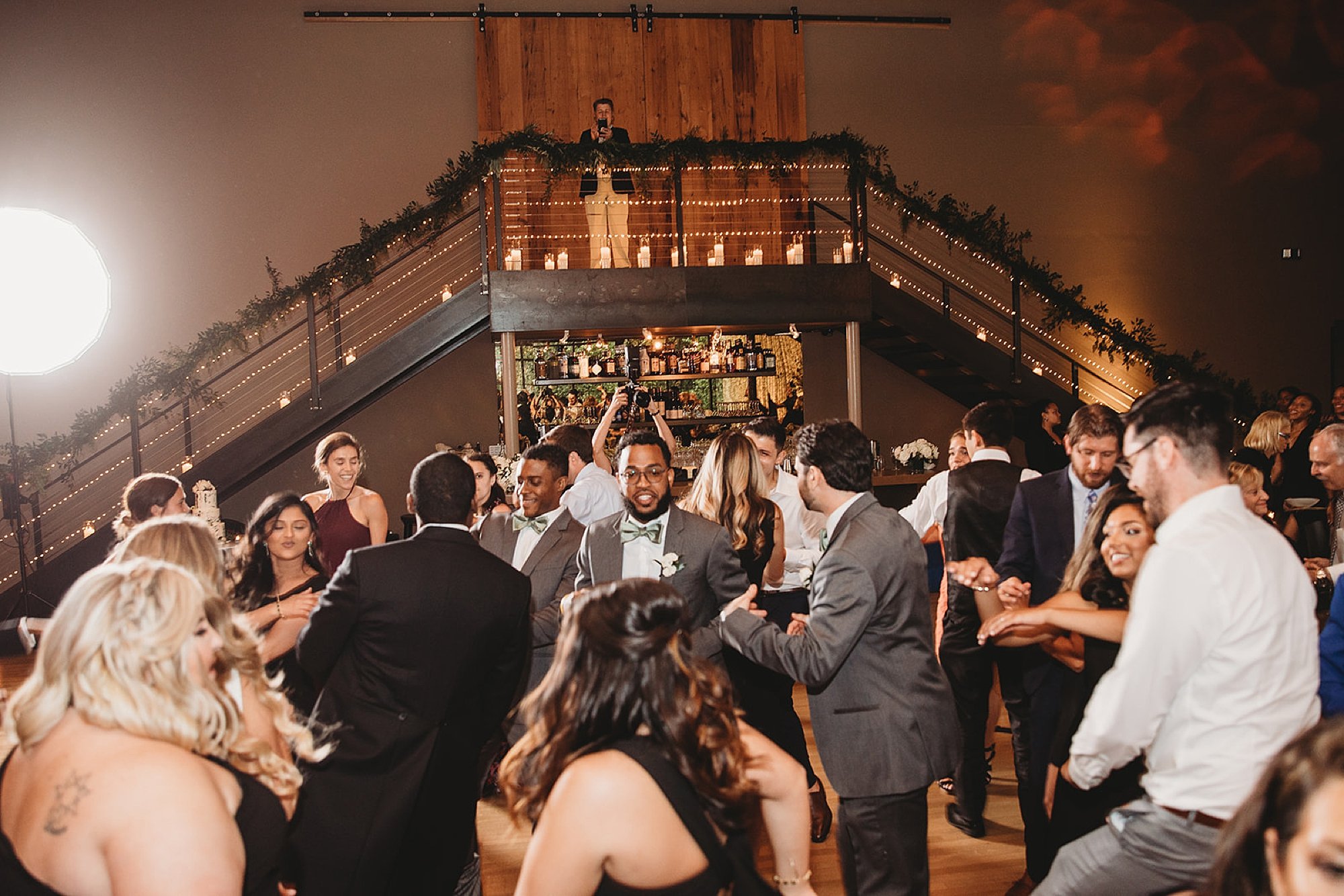 groom dances with guests at Beacon NY wedding reception