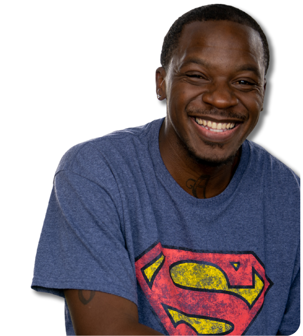 Smiling Young Man in Superman Tee