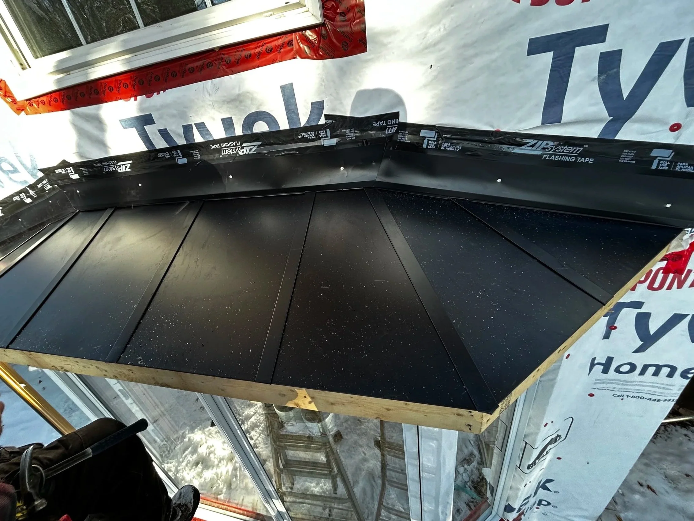 Bay window in hand-made aluminium roof.  Masonville, London