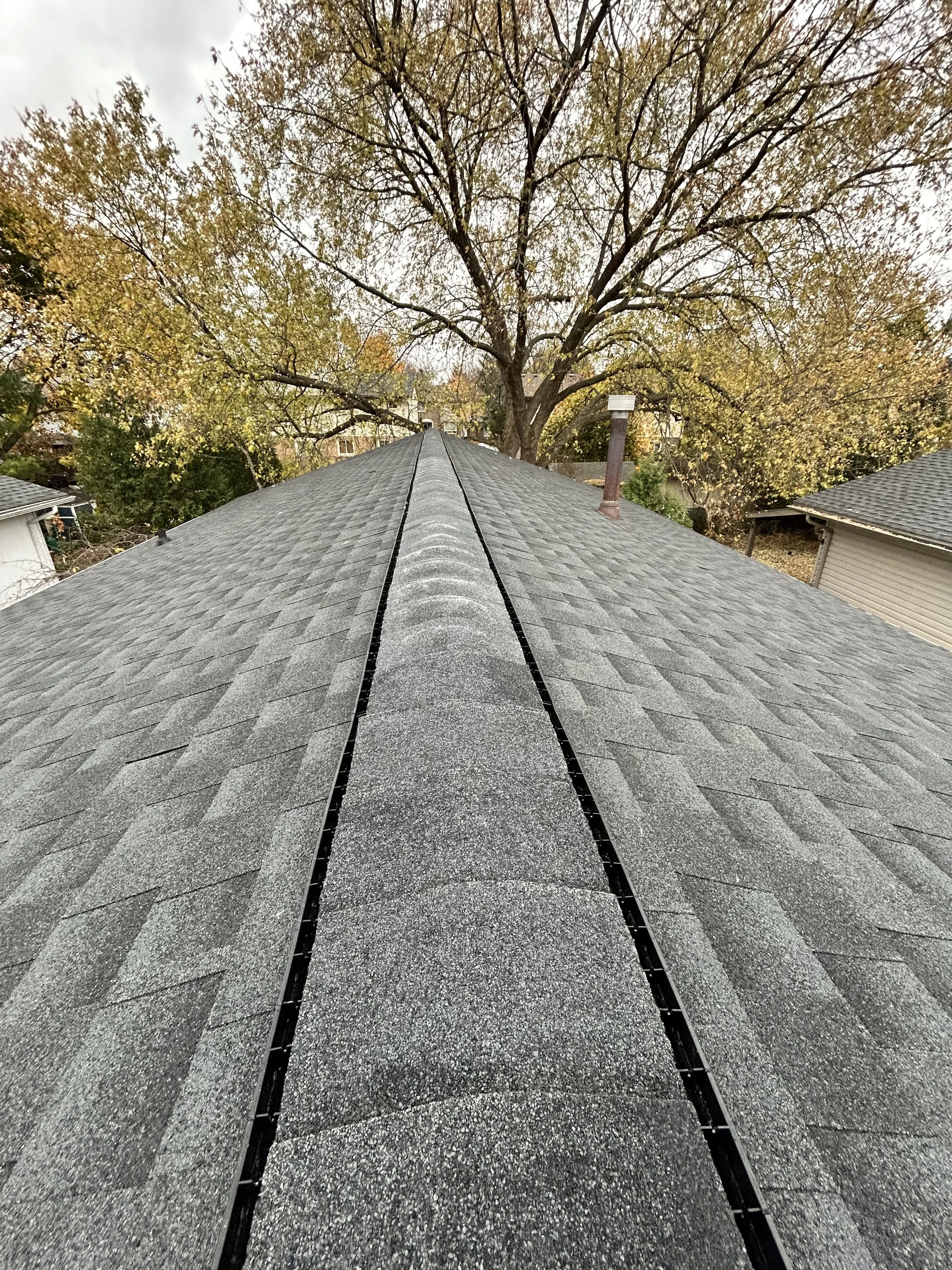 Ridge Vent against Pewter Grey HDZ shingles by GAF