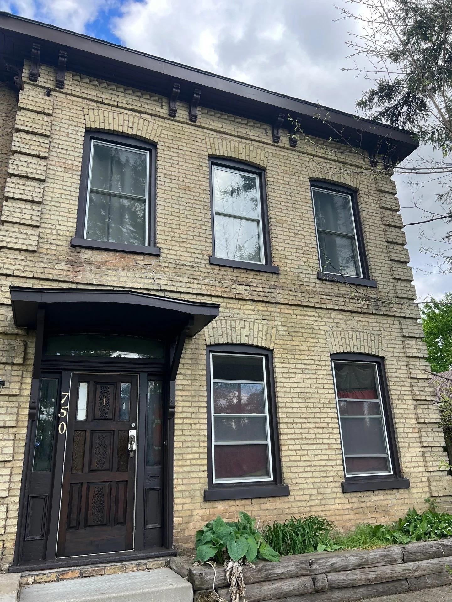 A full rebuild and rescue of the overhangs entranceways, plus a deep rehab on the historic wood mouldings - Maitland Ave, London