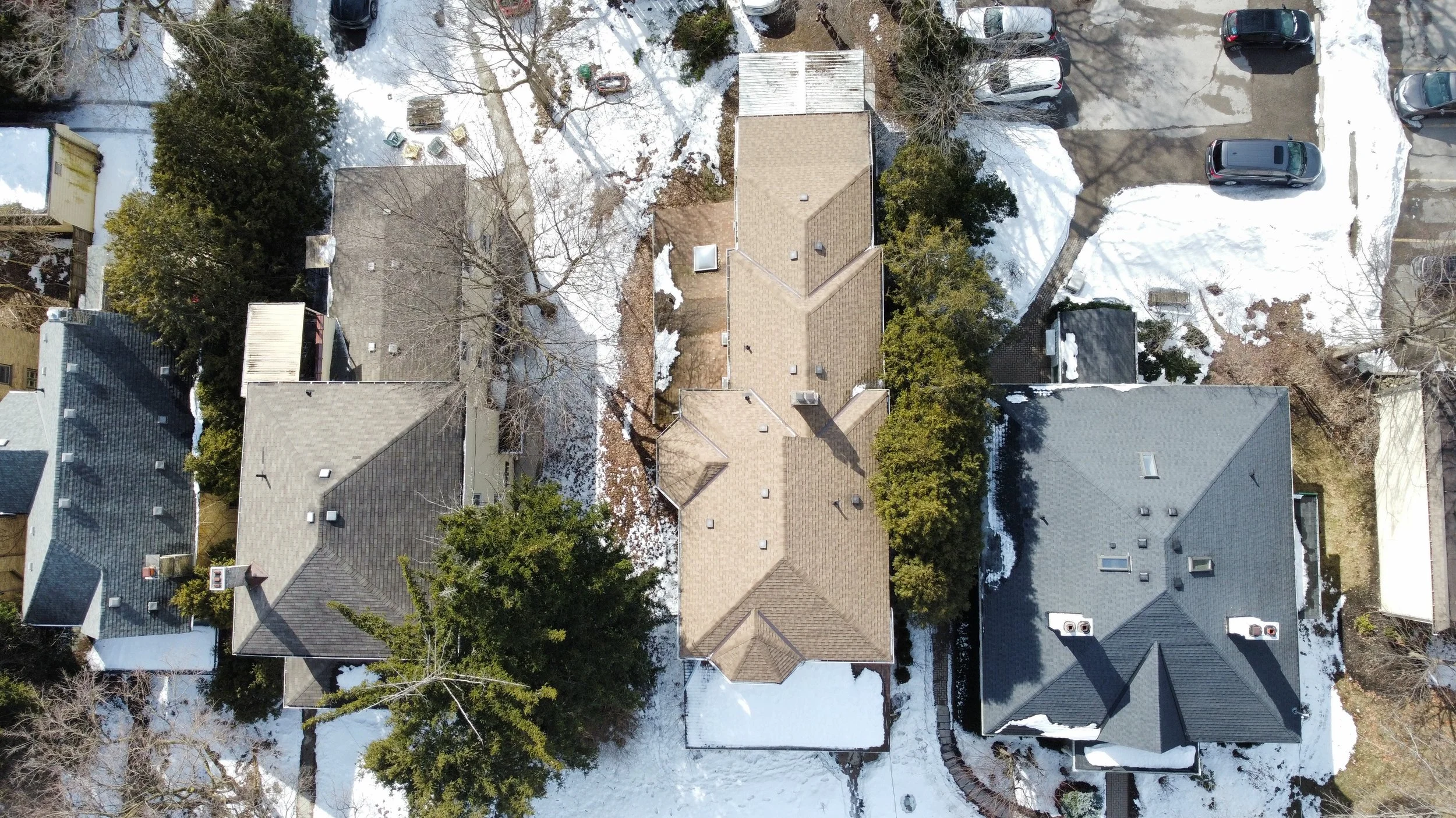 Earthtone Cedar shingles on this London home