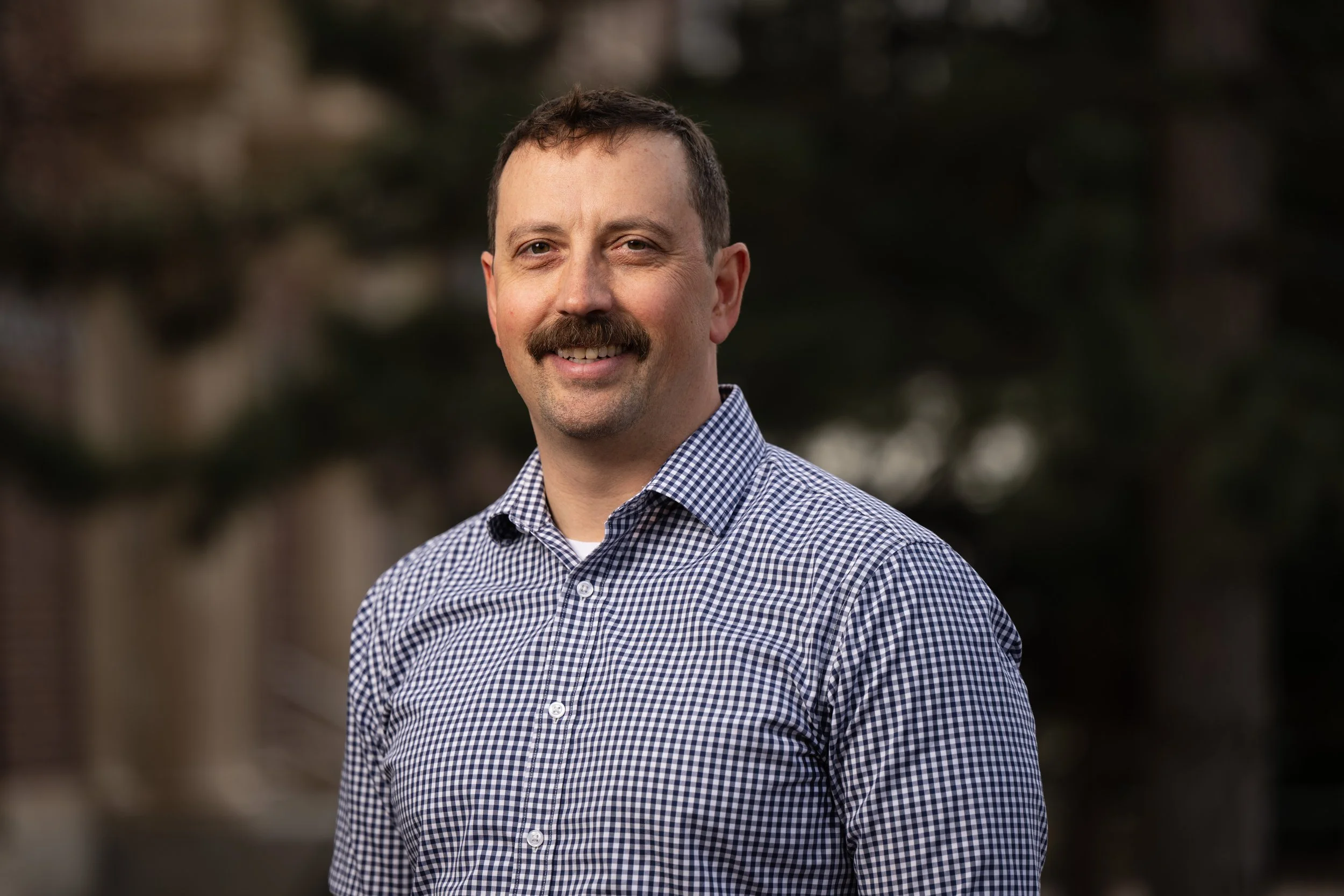 Headshot of Alex Metcalf