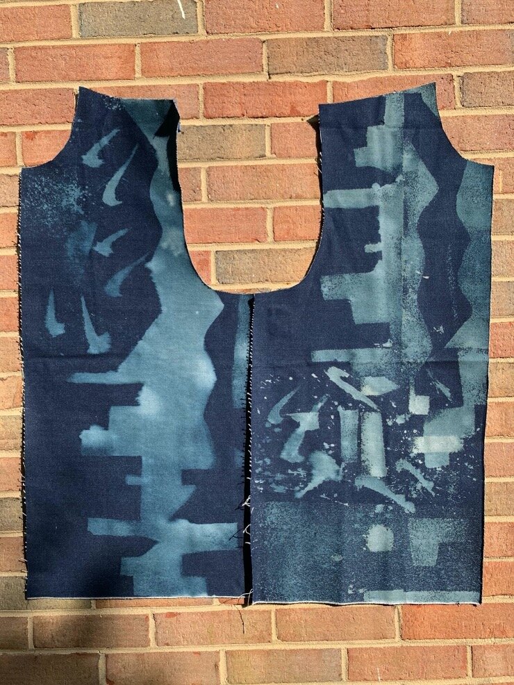 Juntos, stenciled bleach on denim, 27x30”, 2021