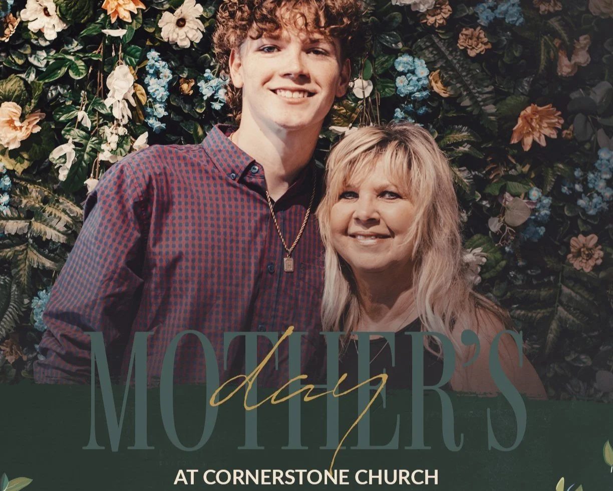 A young man and an older woman smiling in front of a floral background at Cornerstone Church, with text overlay reading "Mother's Day at Cornerstone Church."