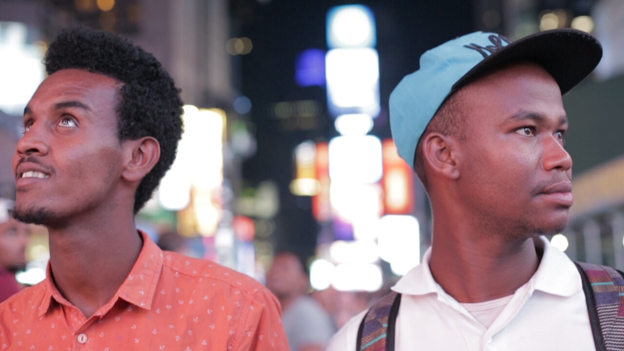 00 Times Square -- the guys had never left Ethiopia before last month. Here they are, wide-eyes in Times Square.jpg