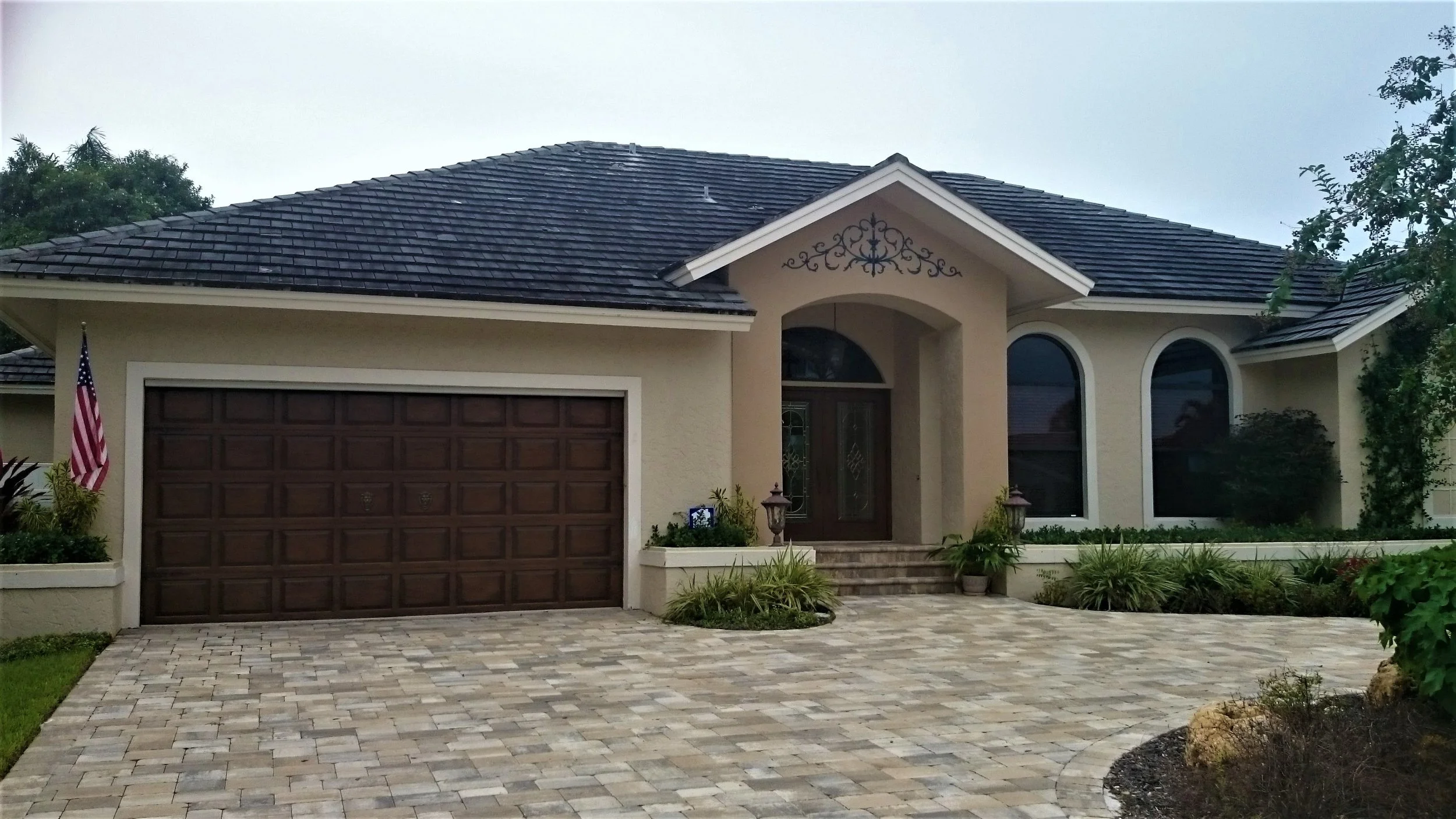Wrought Iron Decor Design with dark walnut wood grain doors